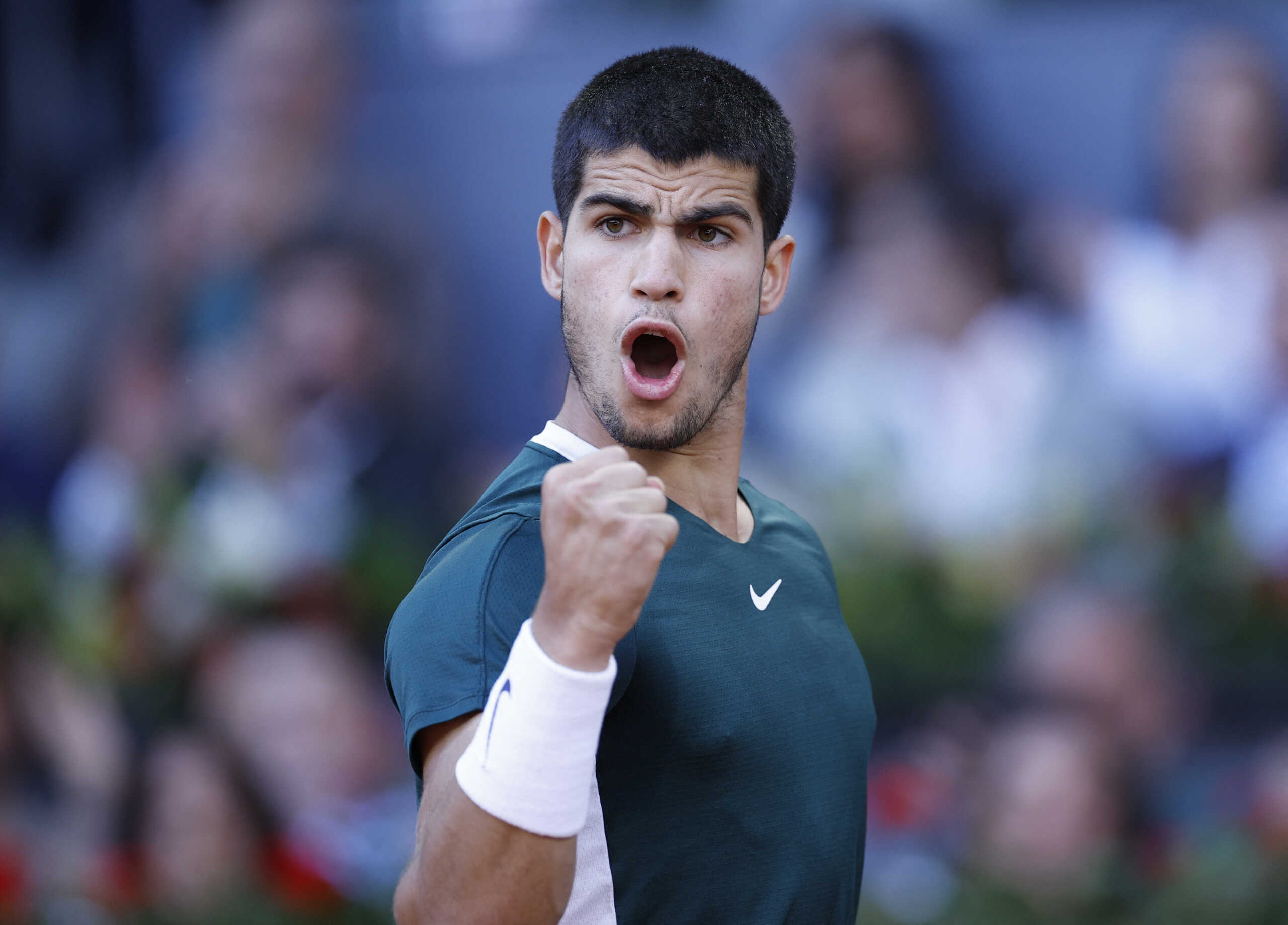 Tennis - ATP Masters 1000 - Madrid Open - Caja Magica, Madrid, Spain - May 8, 2022  Spain's Carlos Alcaraz Garfia reacts during the final against Germany's Alexander Zverev REUTERS