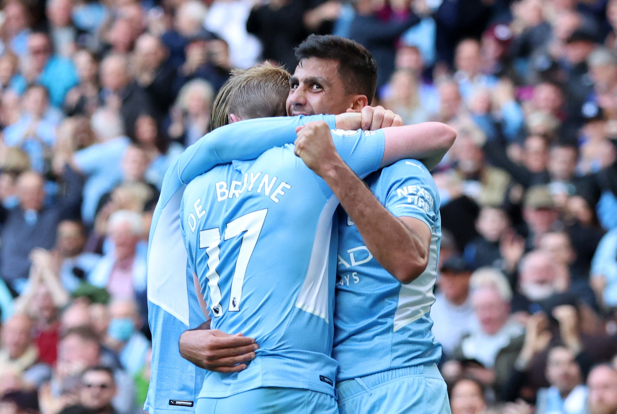 Soccer Football - Premier League - Manchester City v Newcastle United - Etihad Stadium, Manchester, Britain - May 8, 2022 Manchester City's Rodri celebrates scoring their third goal with Kevin De Bruyne and Jack Grealish REUTERS