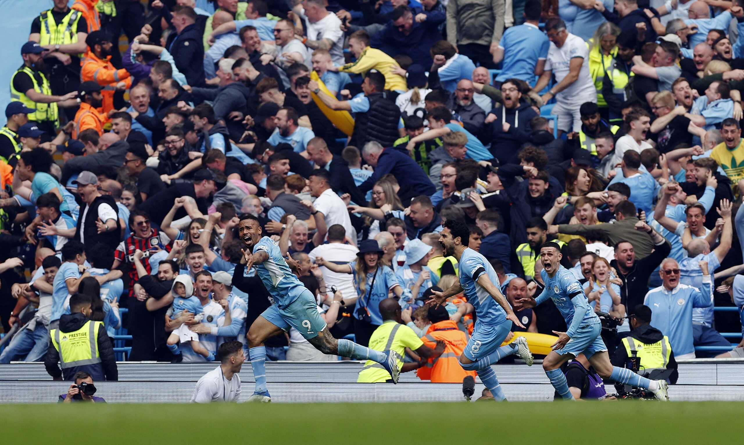 Soccer Football - Premier League - Manchester City v Aston Villa - Etihad Stadium, Manchester, Britain - May 22, 2022 Manchester City's Ilkay Gundogan celebrates scoring their third goal with Gabriel Jesus and Phil Foden Action Images via Reuters