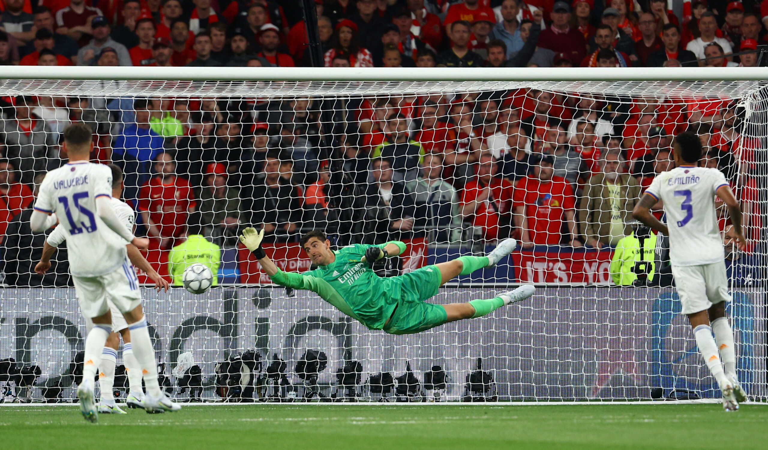 Soccer Football - Champions League Final - Liverpool v Real Madrid - Stade de France, Saint-Denis near Paris, France - May 28, 2022 Real Madrid's Thibaut Courtois makes a save REUTERS