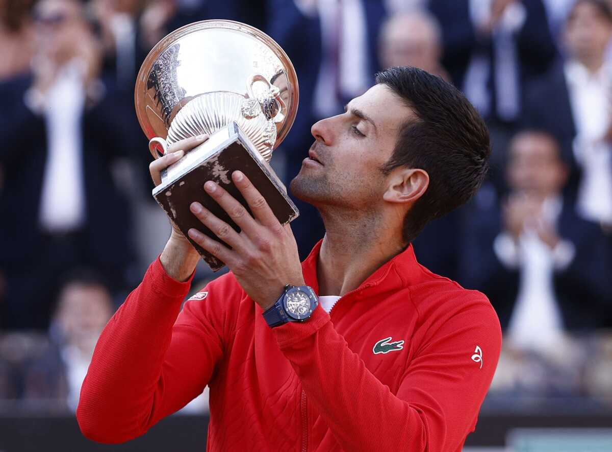 Tennis - ATP Masters 1000 - Italian Open - Foro Italico, Rome, Italy - May 15, 2022 Serbia's Novak Djokovic celebrates with the trophy after winning the final against Greece's Stefanos Tsitsipas REUTERS
