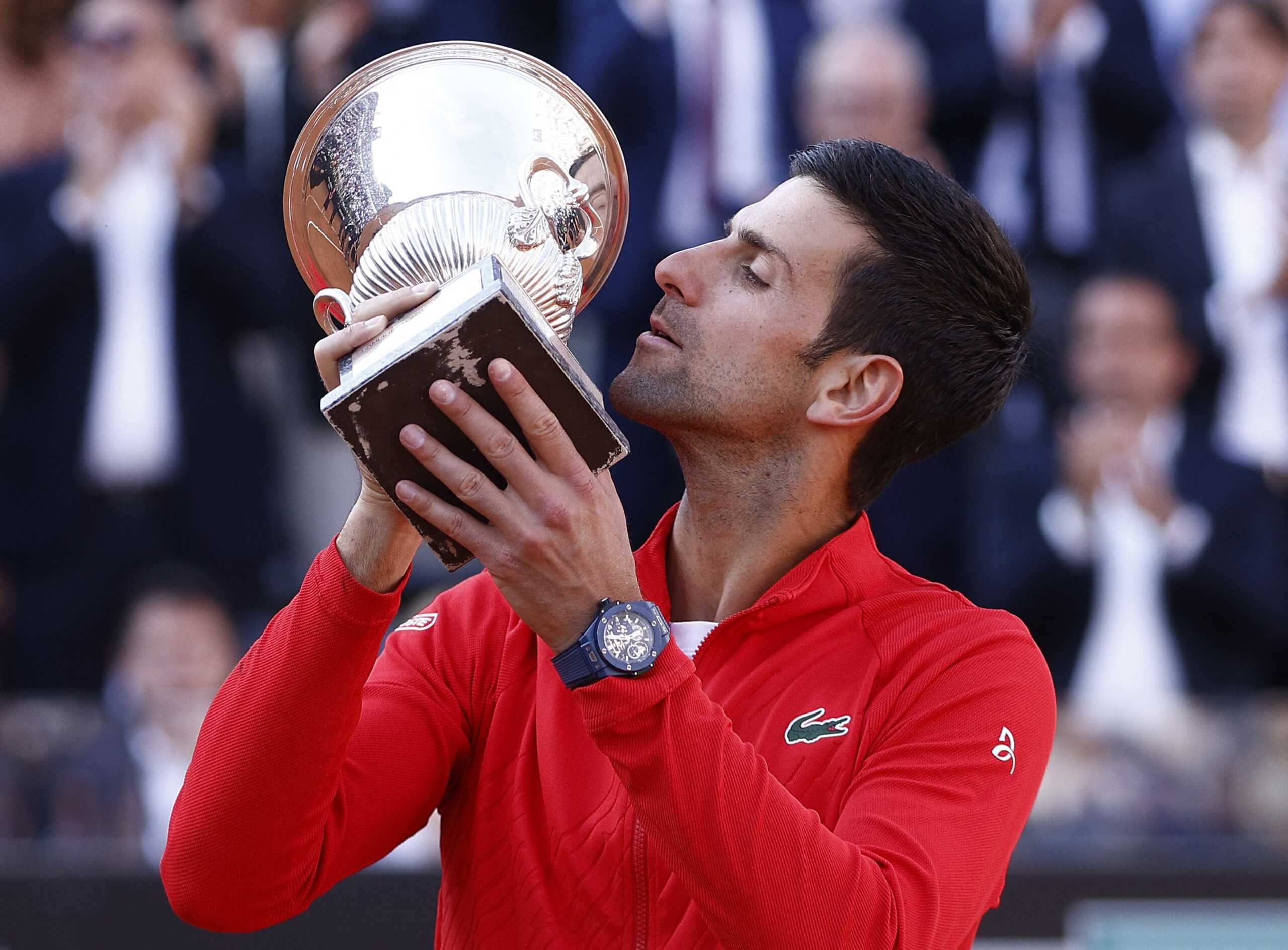 Tennis - ATP Masters 1000 - Italian Open - Foro Italico, Rome, Italy - May 15, 2022 Serbia's Novak Djokovic celebrates with the trophy after winning the final against Greece's Stefanos Tsitsipas REUTERS