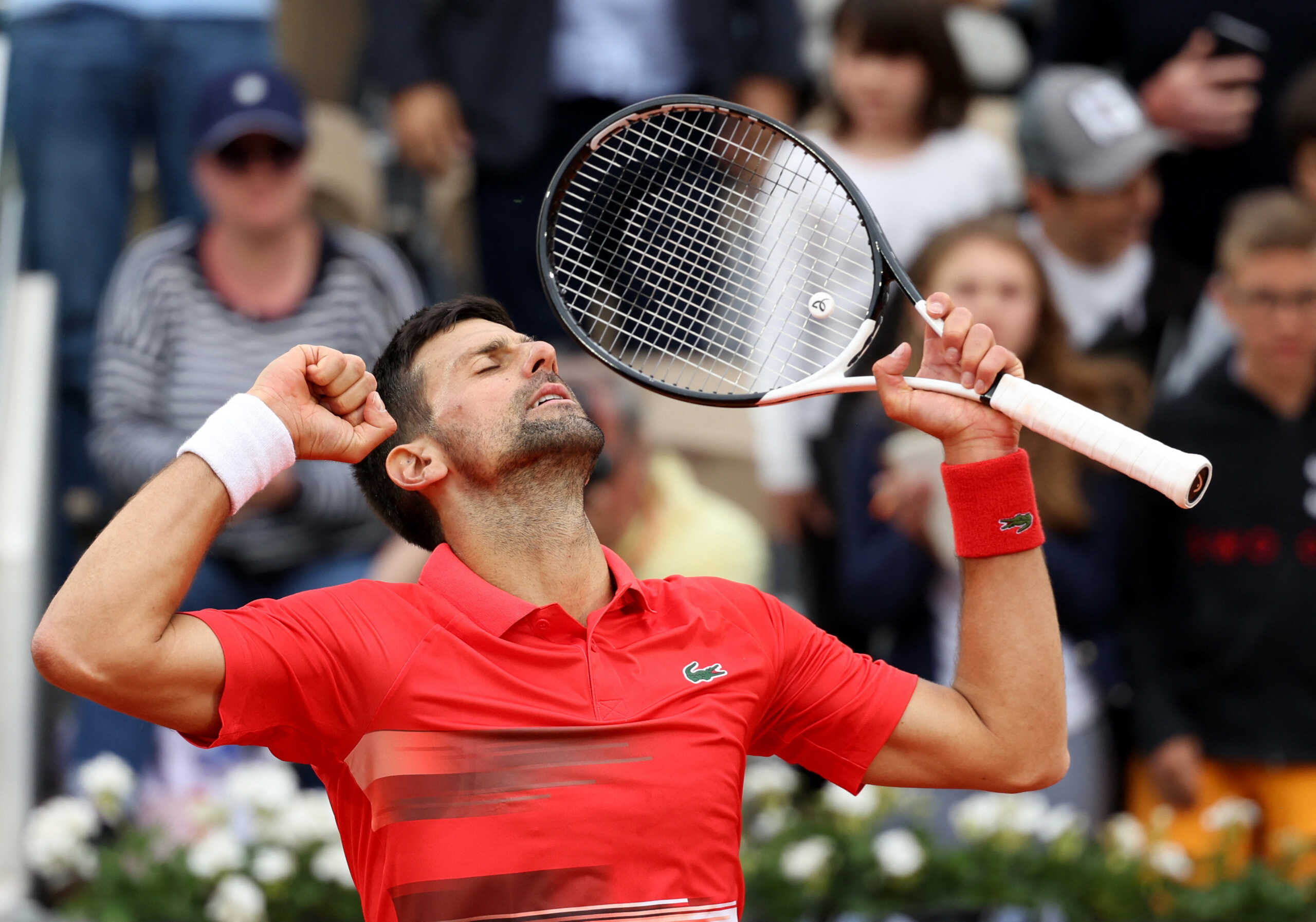 Tennis - French Open - Roland Garros, Paris, France - May 25, 2022 Serbia's Novak Djokovic celebrates winning his second round match against Slovakia's Alex Molcan REUTERS