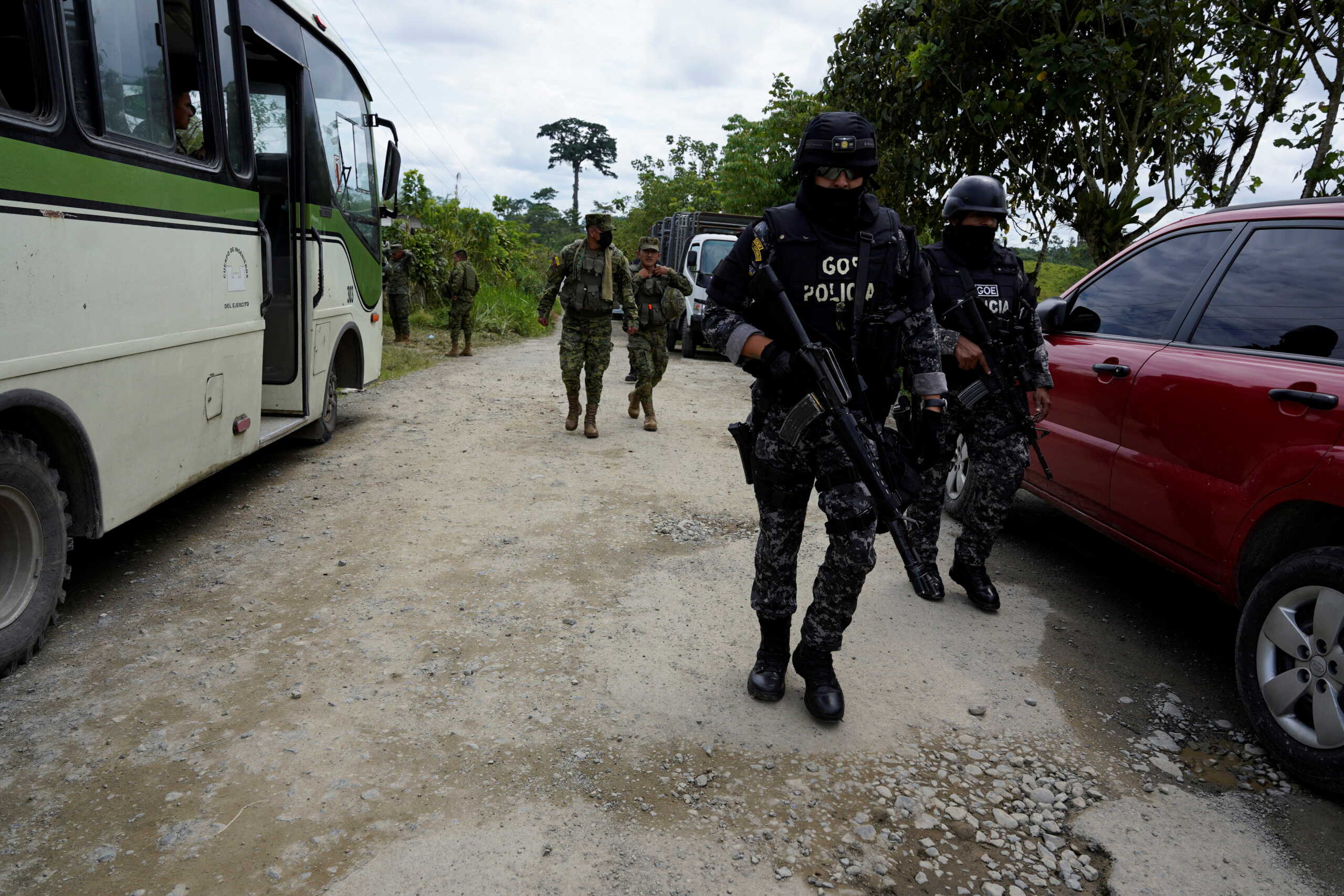 Police officers guard an area outside the Santo Domingo de los Tsachilas prison after Ecuadorean authorities reported that they managed to put out a riot and recapture several inmates that had escaped, in Santo Domingo, Ecuador May 9, 2022. REUTERS