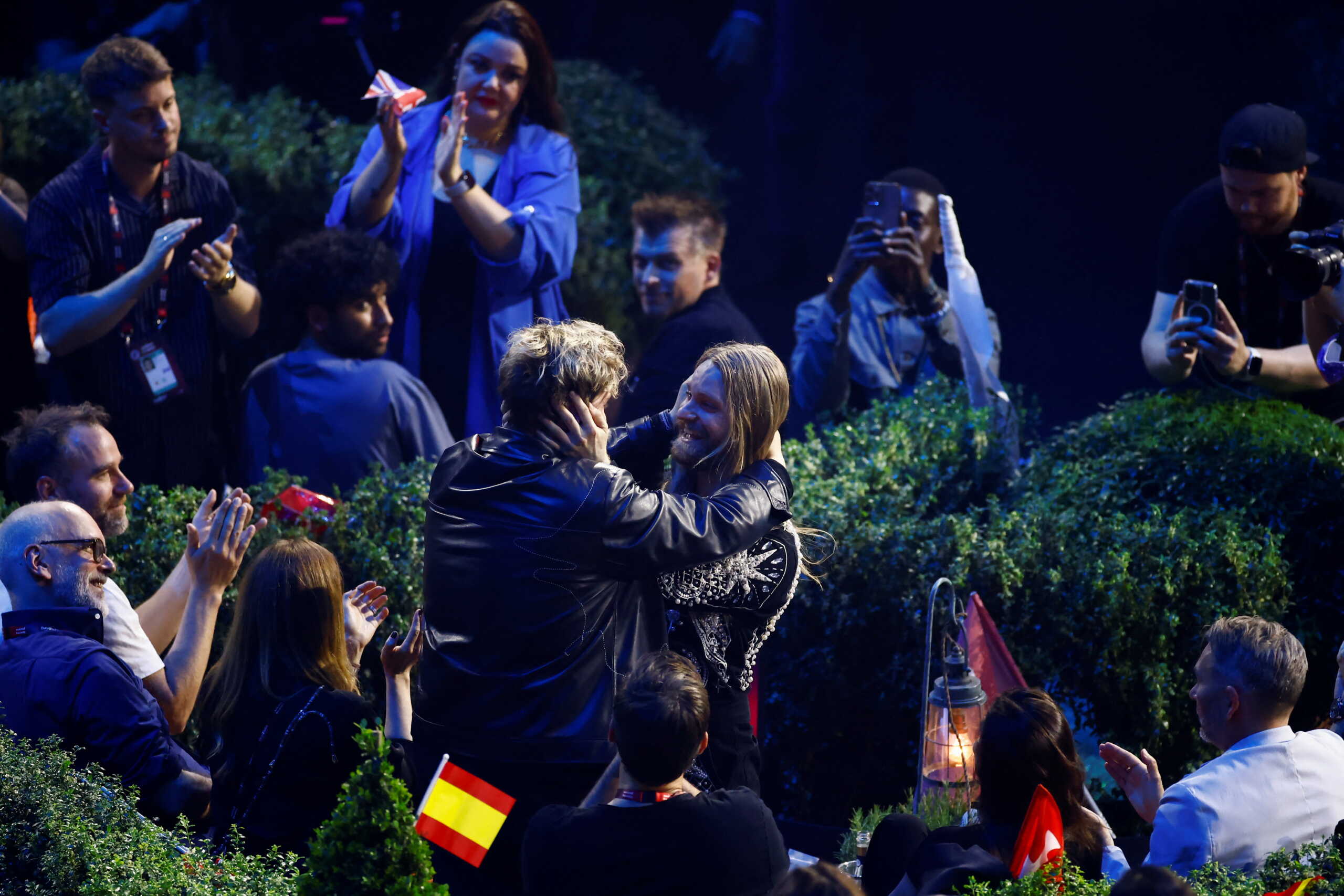 Sam Ryder of United Kingdom and Marius Bear from Switzerland embrace during the final of the 2022 Eurovision Song Contest in Turin, Italy, May 15, 2022. REUTERS