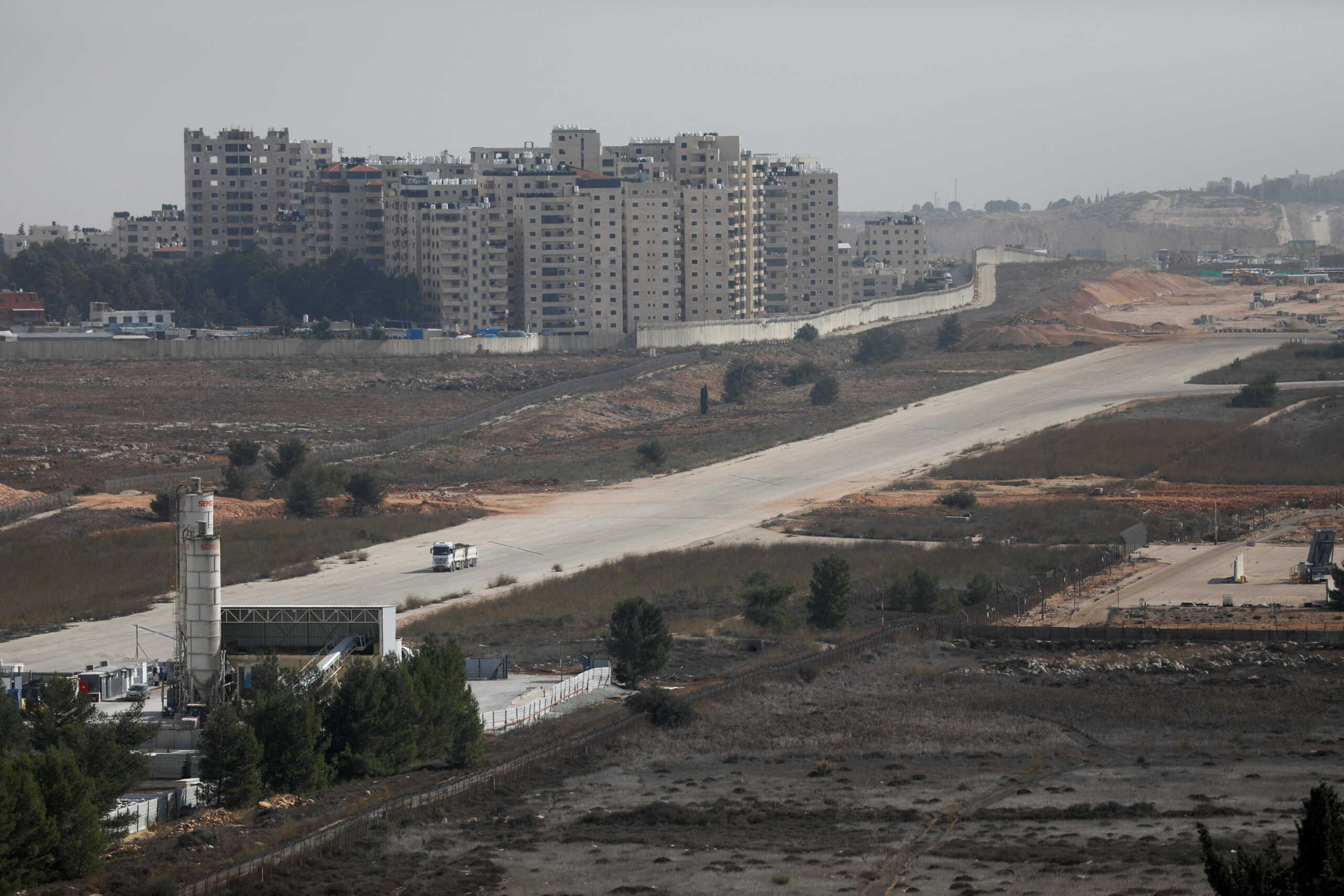 FILE PHOTO: A general view shows an area over the Israeli-occupied West Bank boundary, near the Palestinian city of Ramallah November 25, 2021. REUTERS