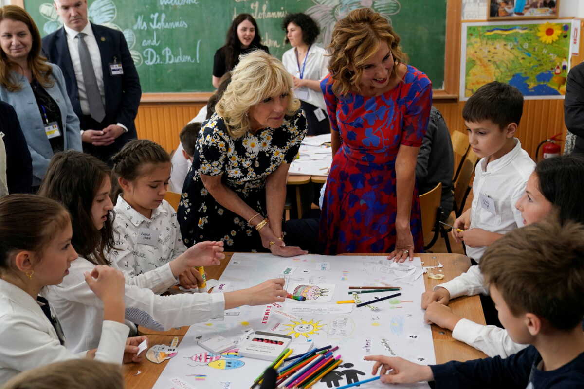 U.S. first lady Jill Biden and Romania's first lady Carmen Johannis visit the Scoala Gimnaziala Uruguay, or Uruguay School, in Bucharest, Romania, May 7, 2022. Susan Walsh