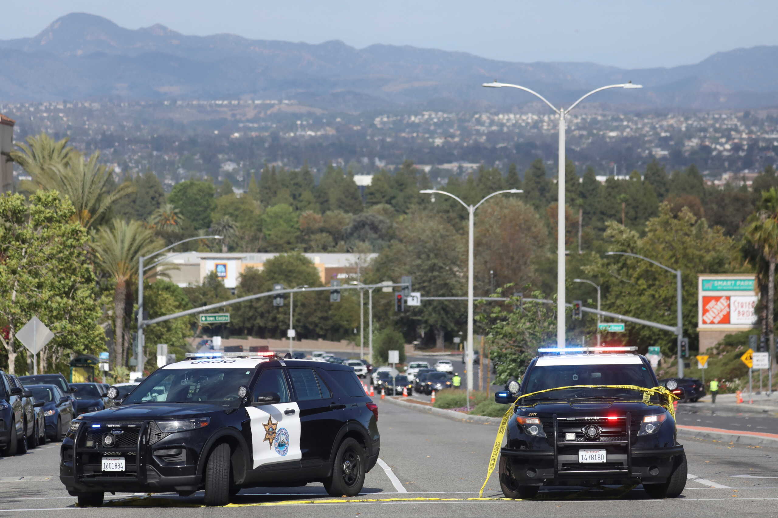 Police cars are seen after a deadly shooting at Geneva Presbyterian Church in Laguna Woods, California, U.S. May 15, 2022.  REUTERS