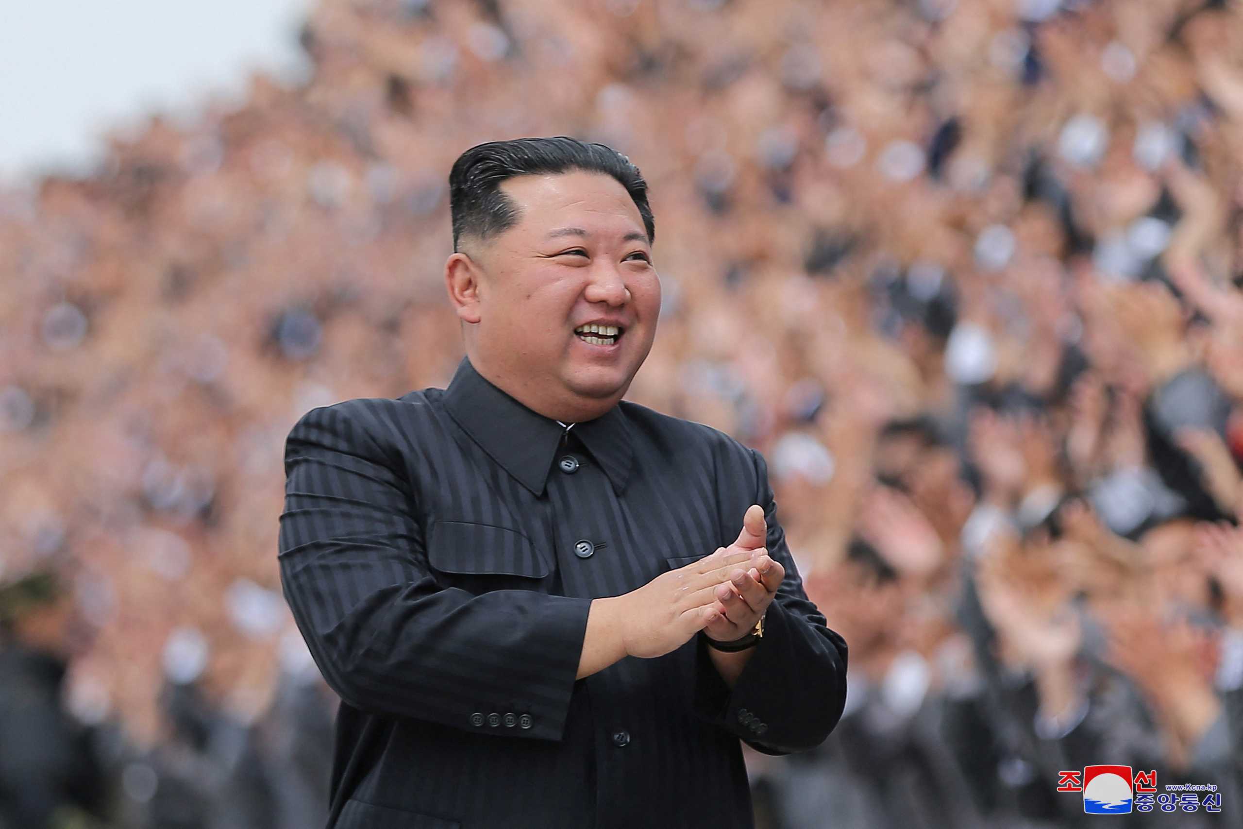North Korean leader Kim Jong Un applauds during a photo session with students and young workers in Pyongyang, North Korea, in this undated photo released by North Korea's Korean Central News Agency (KCNA) on May 1, 2022. KCNA via REUTERS    ATTENTION EDITORS - THIS IMAGE WAS PROVIDED BY A THIRD PARTY. REUTERS IS UNABLE TO INDEPENDENTLY VERIFY THIS IMAGE. NO THIRD PARTY SALES. SOUTH KOREA OUT. NO COMMERCIAL OR EDITORIAL SALES IN SOUTH KOREA.