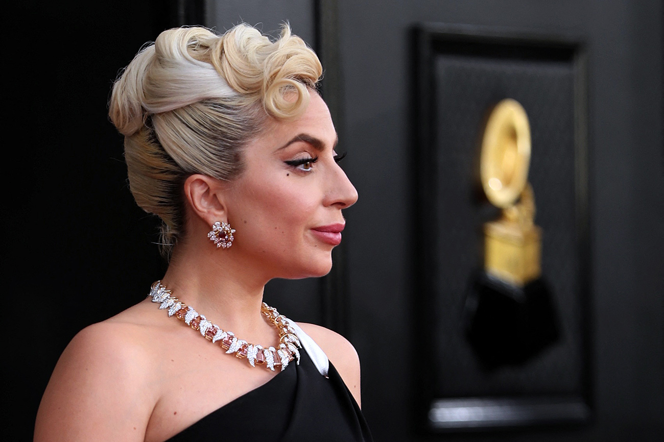 Lady Gaga poses on the red carpet at the 64th Annual Grammy Awards at the MGM Grand Garden Arena in Las Vegas, Nevada, U.S., April 3, 2022. REUTERS