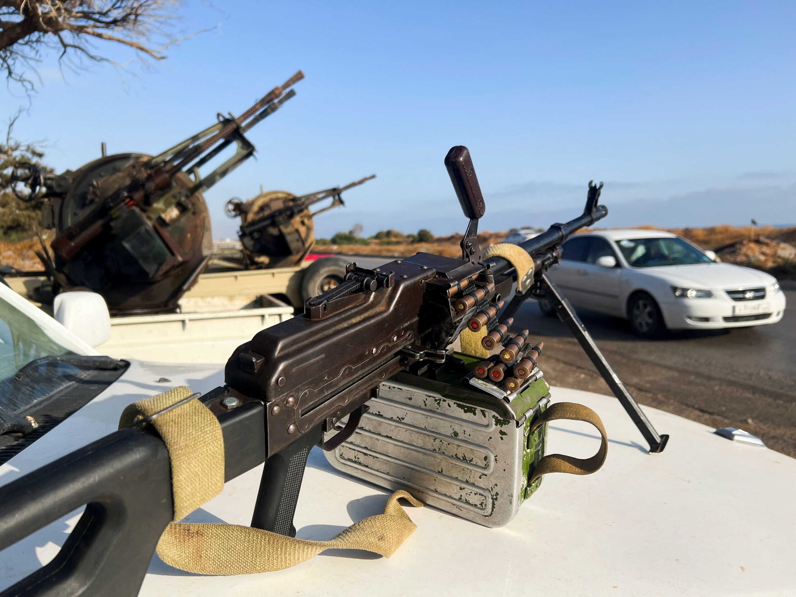 Military vehicles mounted with heavy weapons belonging to pro-PM Dbeibah Constitution Protection Force are pictured in Tripoli, Libya, May 17, 2022. REUTERS
