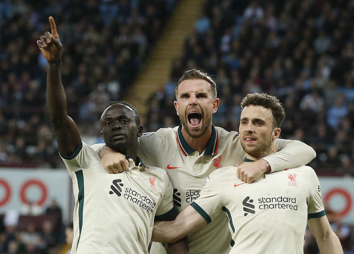 Soccer Football - Premier League - Aston Villa v Liverpool, Villa Park, Birmingham, Britain - May 10, 2022 Liverpool's Sadio Mane celebrates scoring their second goal with Diogo Jota and Jordan Henderson REUTERS