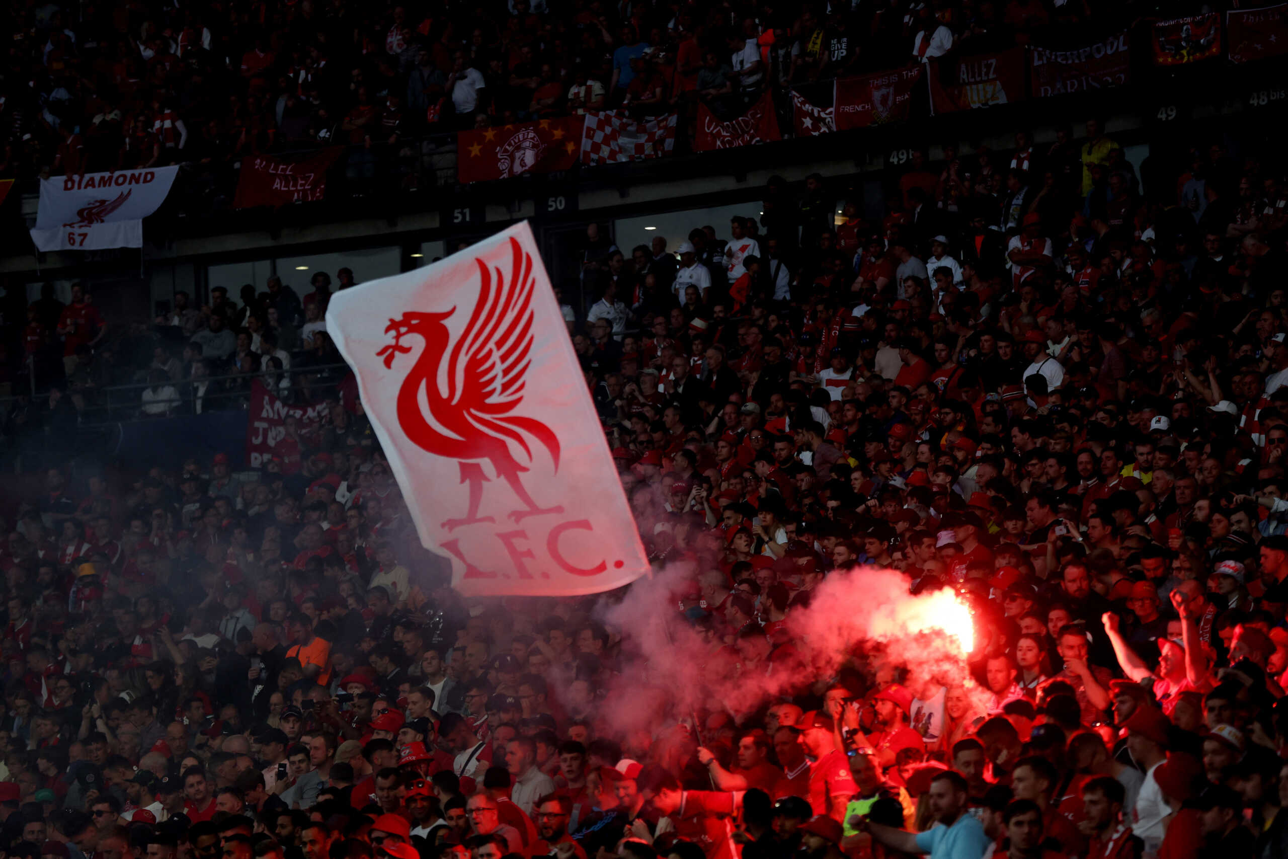 Soccer Football - Champions League Final - Liverpool v Real Madrid - Stade de France, Saint-Denis near Paris, France - May 28, 2022 Liverpool fans light a flare during the match REUTERS