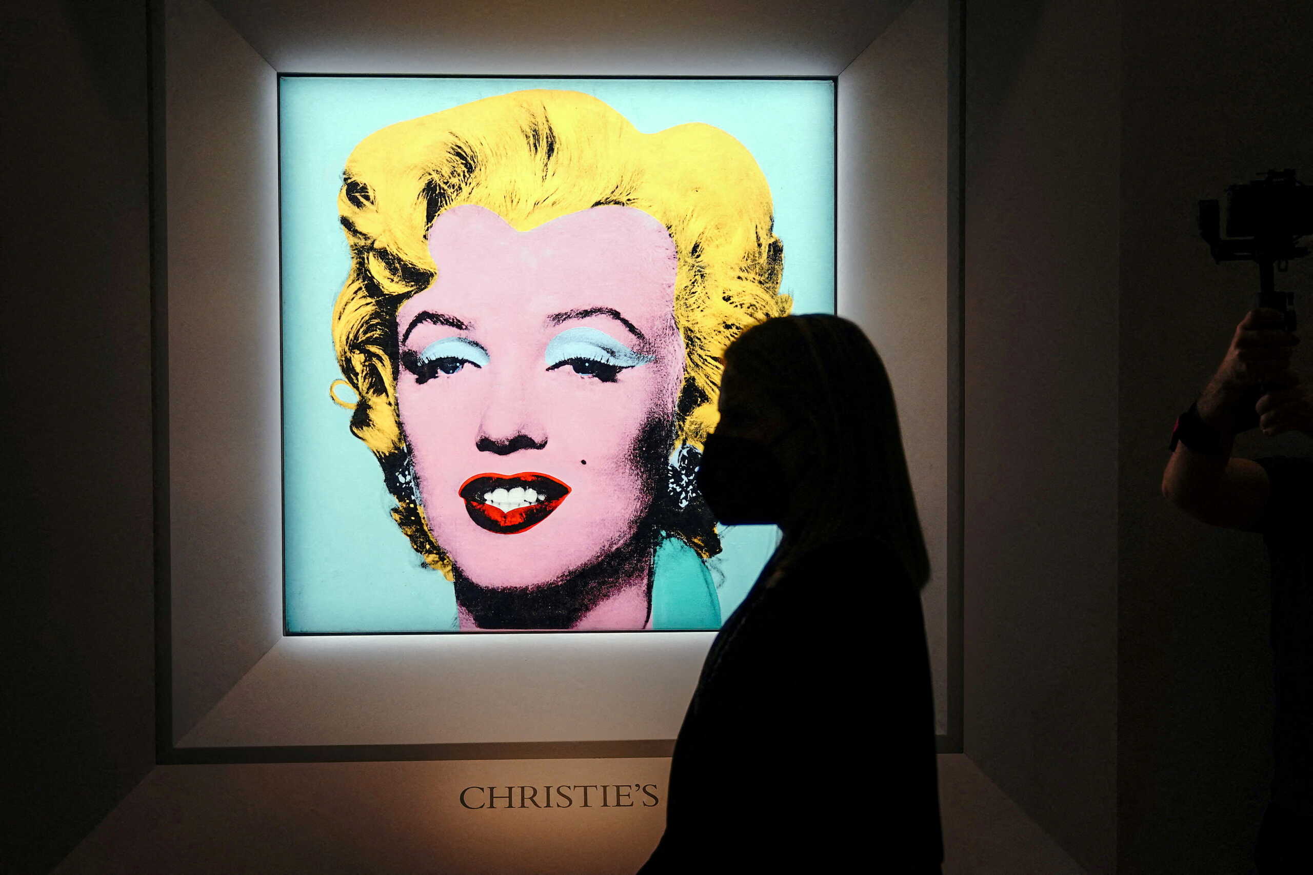FILE PHOTO: Andy Warhol's "Shot Sage Blue Marilyn", a painting of Marilyn Monroe, is pictured on display at Christie's Auction House in advance of the piece going up for auction in the Manhattan borough of New York City, New York, U.S., March 21, 2022. REUTERS