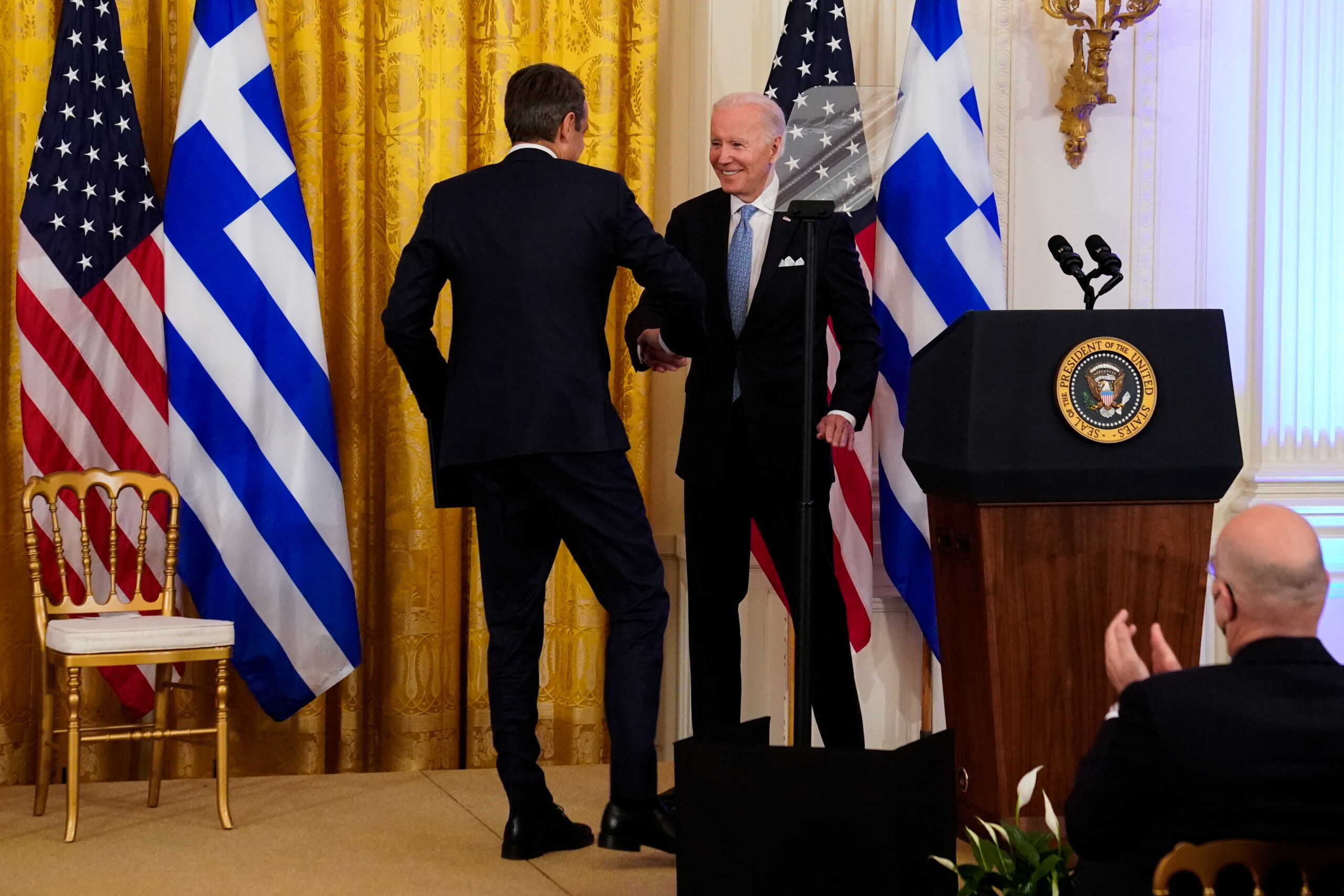 U.S. President Joe Biden shakes hands with Prime Minister Kyriakos Mitsotakis of Greece during a reception for the prime minister and his wife with first lady Jill Biden at White House in Washington, U.S., May 16, 2022. REUTERS