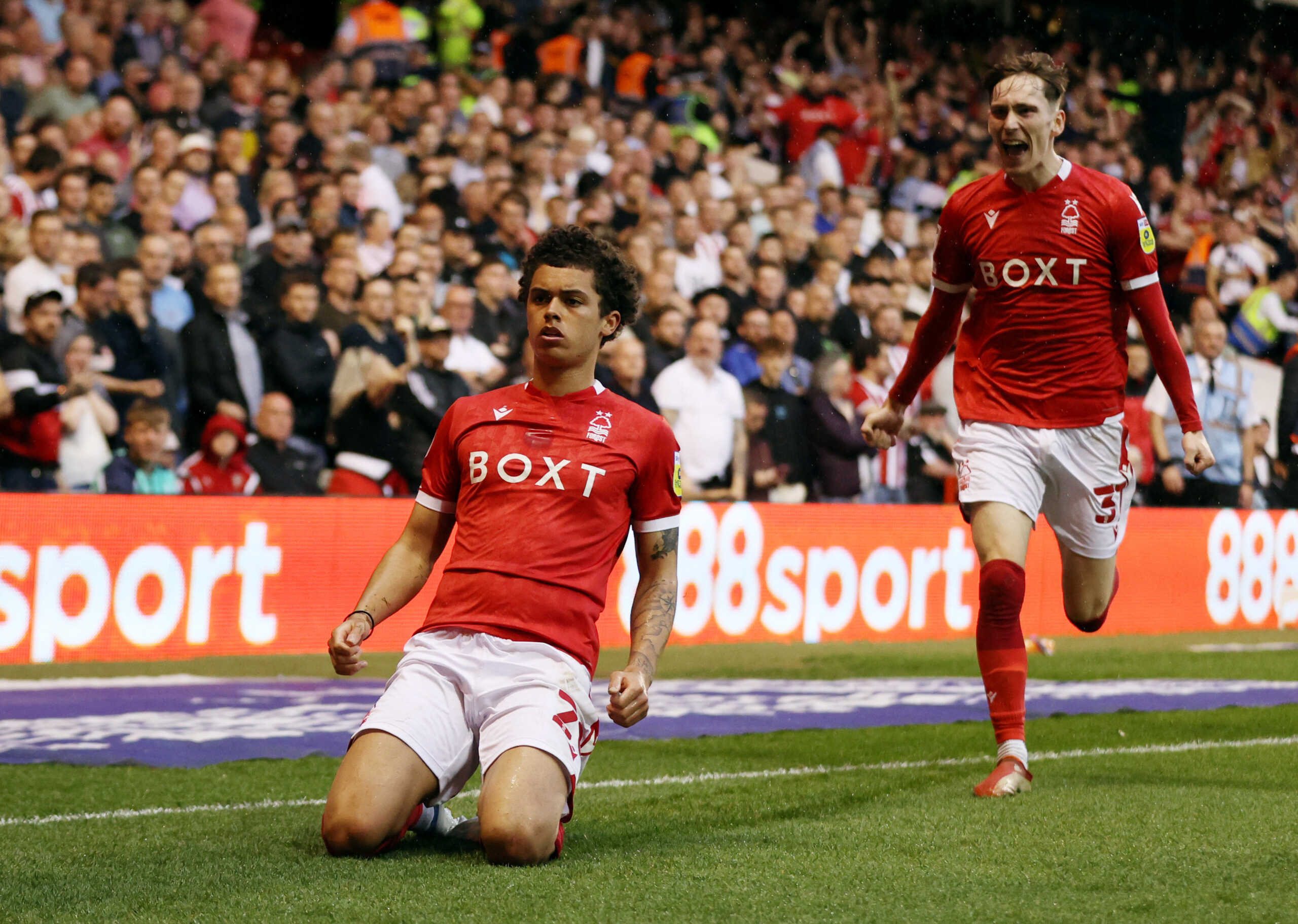 Soccer Football - Championship - Play-Offs Second Leg - Nottingham Forest v Sheffield United - The City Ground, Nottingham, Britain - May 17, 2022 Nottingham Forest's Brennan Johnson celebrates scoring their first goal with James Garner Action Images via Reuters