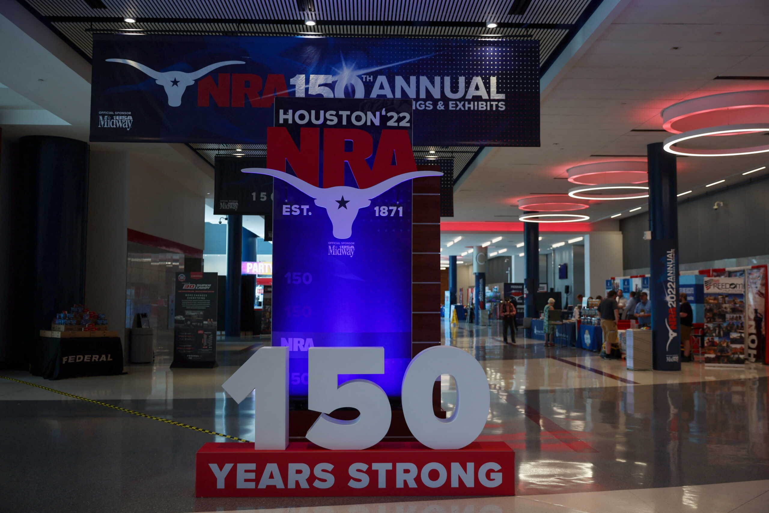 A sign for the National Rifle Association (NRA) annual convention stands inside the George R. Brown Convention Center in downtown Houston, Texas, U.S., May 26, 2022. REUTERS