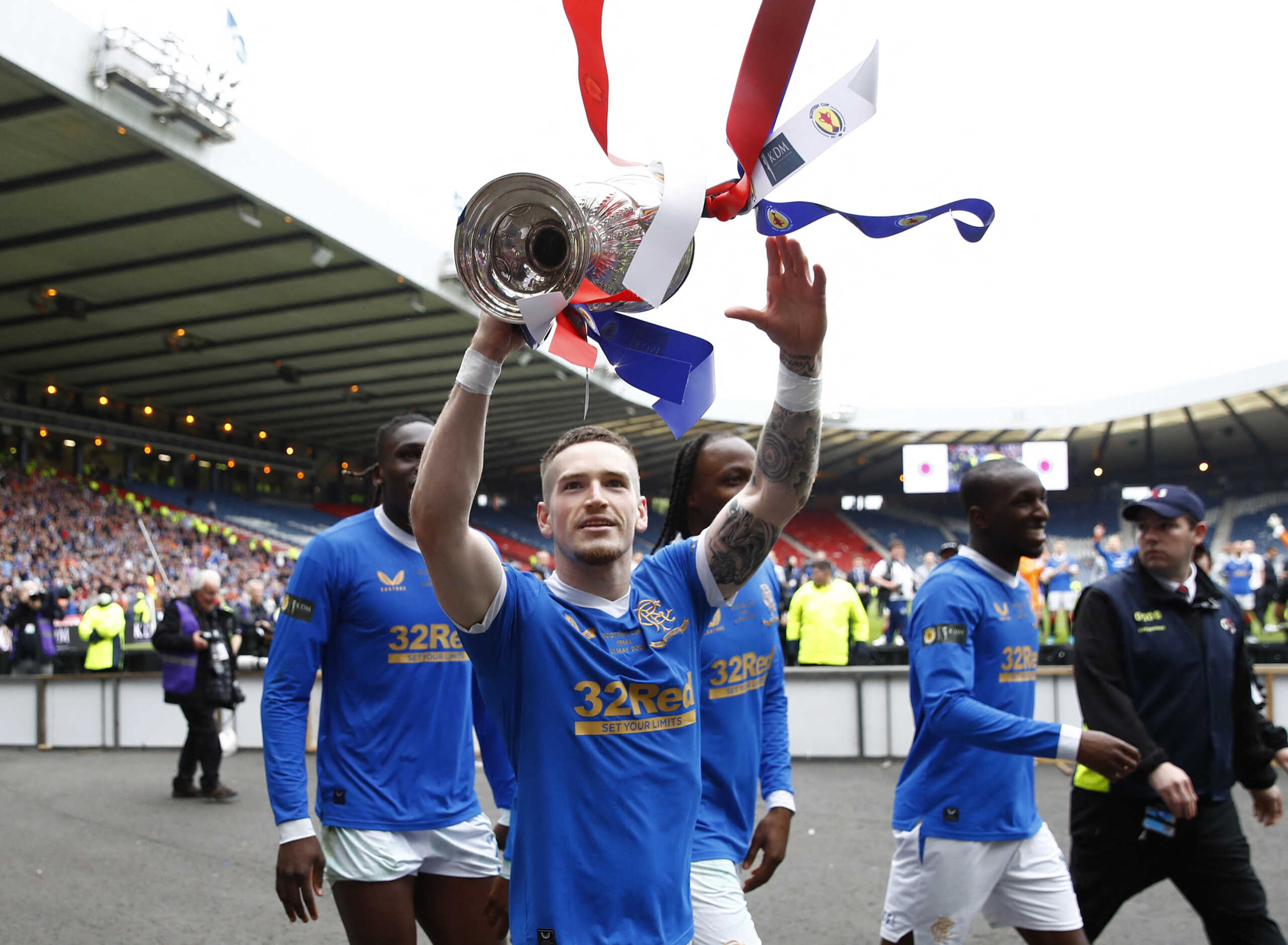 Soccer Football - Scottish Cup - Final - Rangers v Heart of Midlothian - Hampden Park, Glasgow, Scotland, Britain - May 21, 2022  Rangers' Ryan Kent celebrates with the trophy after winning the Scottish Cup Final Action Images via Reuters