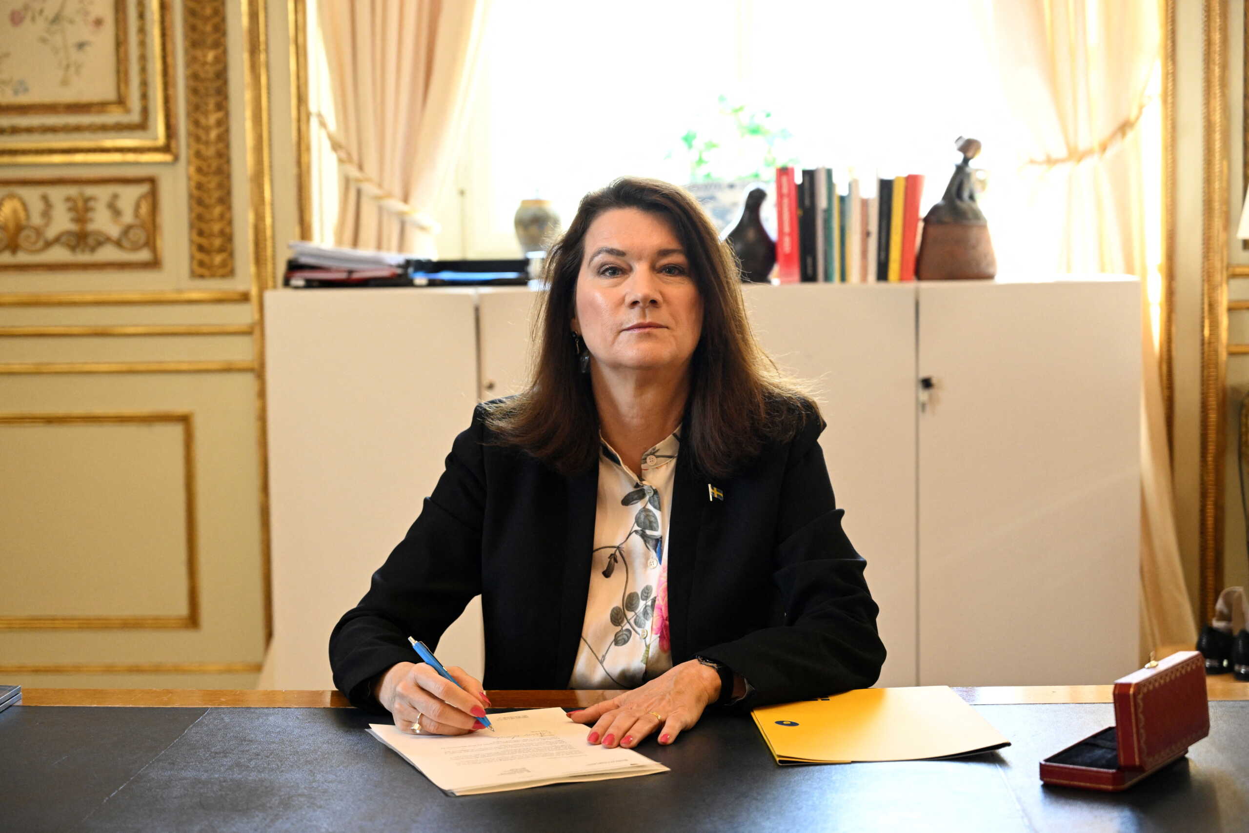 Sweden's Foreign Minister Ann Linde signs the country's application for NATO membership at the Ministry of Foreign Affairs, amid Russia's invasion of Ukraine, in Stockholm, Sweden May 17, 2022. TT News Agency
