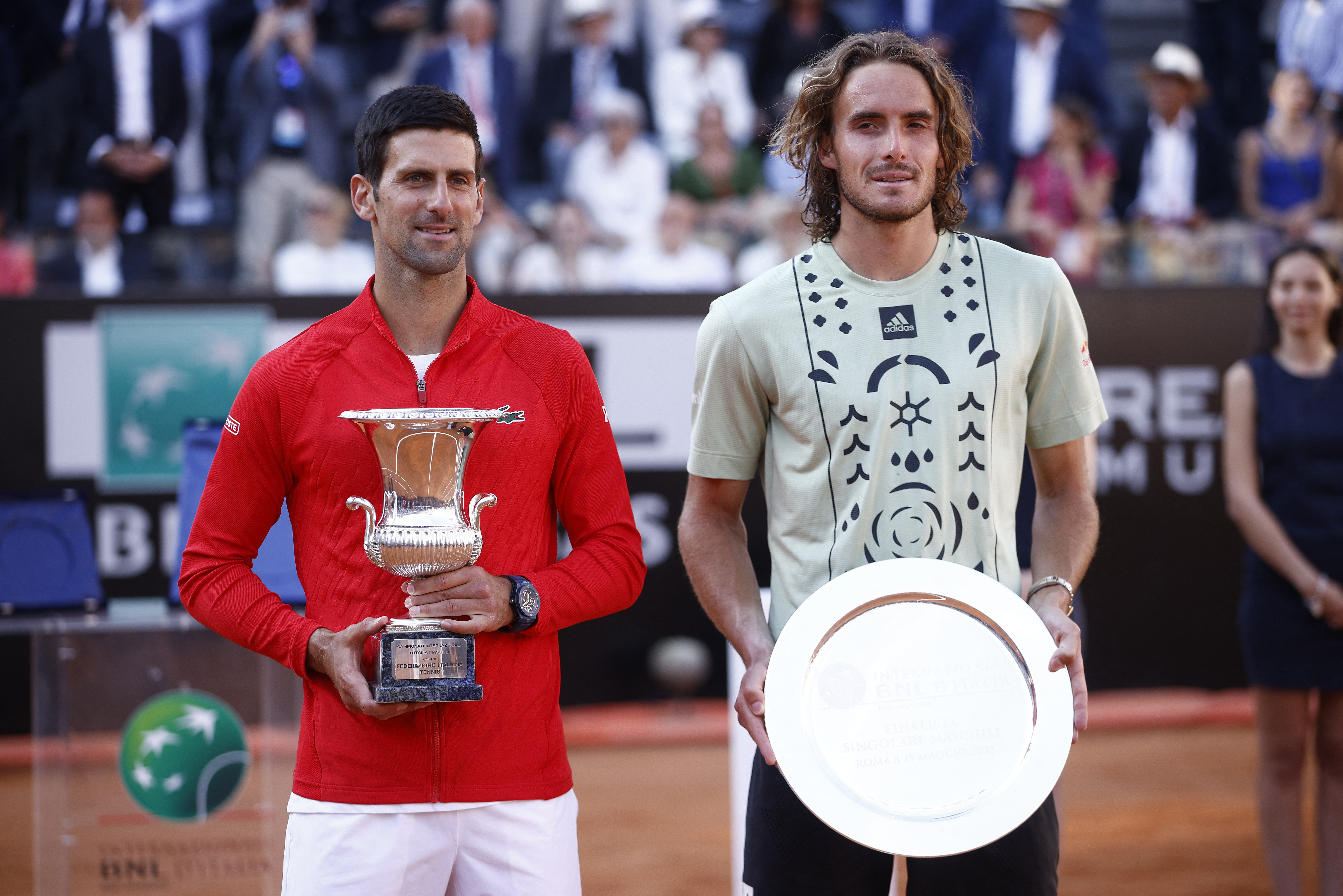 Tennis - ATP Masters 1000 - Italian Open - Foro Italico, Rome, Italy - May 15, 2022 Serbia's Novak Djokovic celebrates with the trophy after winning the final alongside Greece's Stefanos Tsitsipas REUTERS