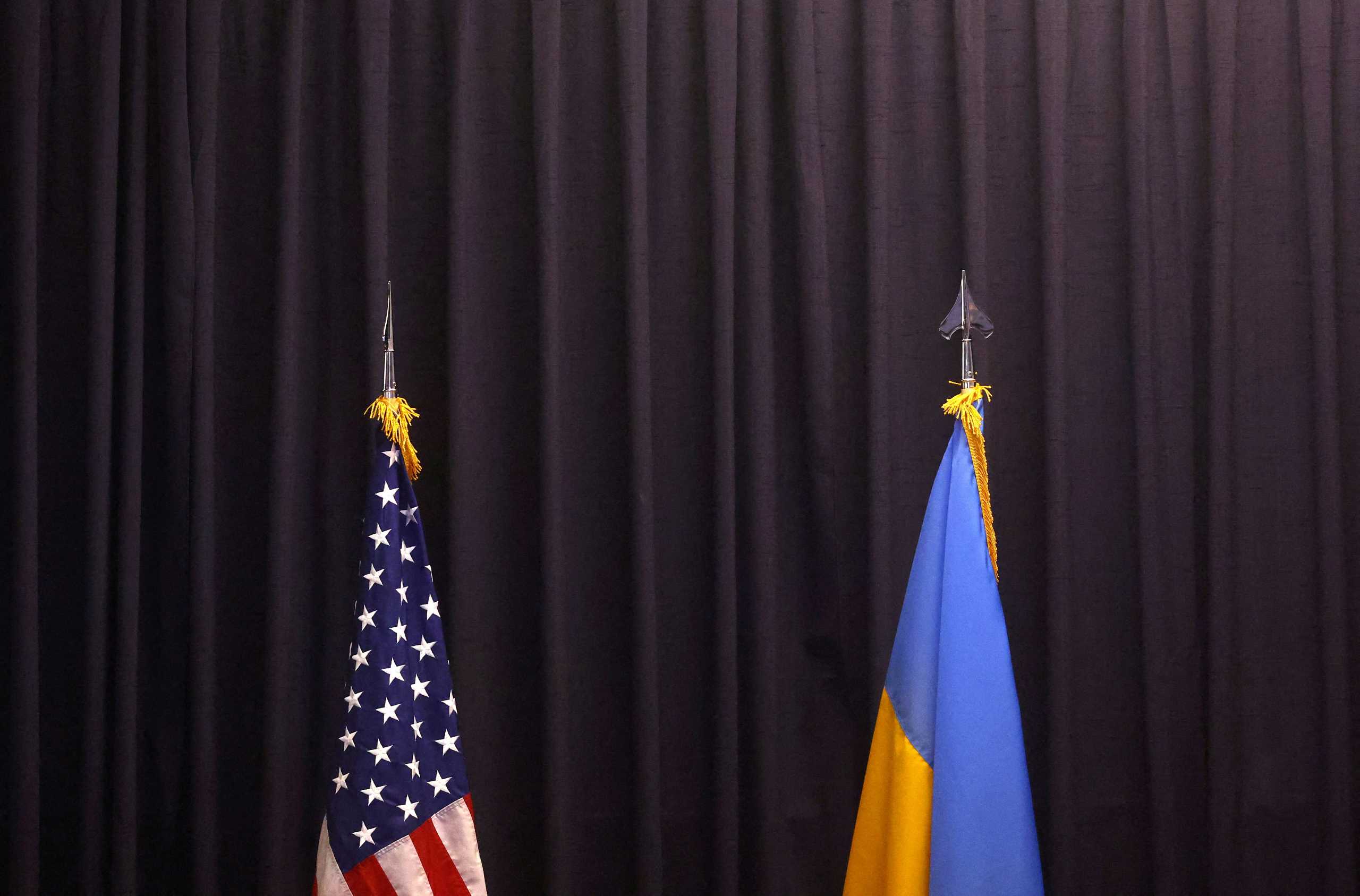 FILE PHOTO: U.S. and Ukrainian flags are pictured at the U.S. air base in Ramstein, Germany, April 26, 2022.  REUTERS
