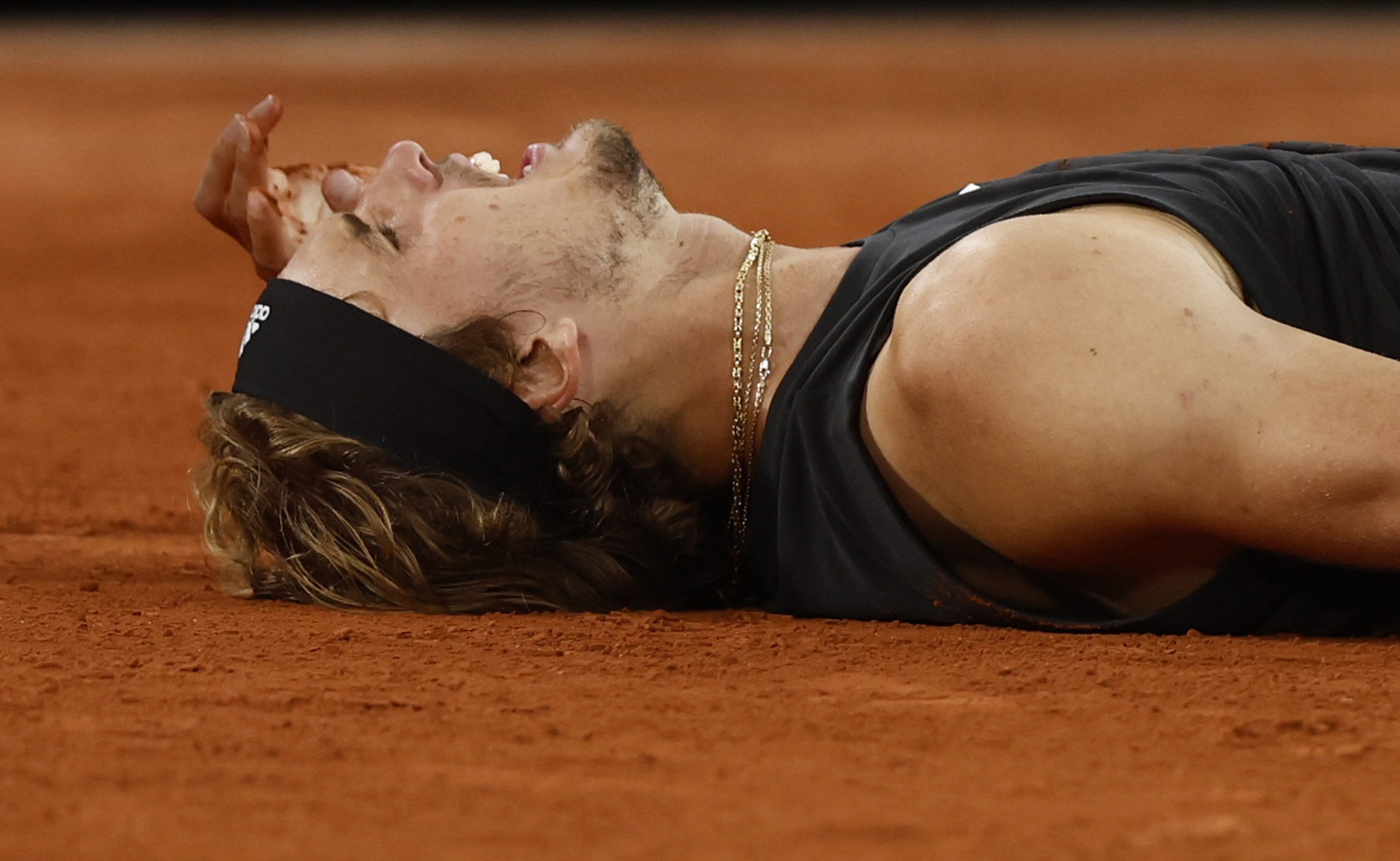 Tennis - French Open - Roland Garros, Paris, France - June 3, 2022 Germany's Alexander Zverev reacts after sustaining an injury during his semi final match against Spain's Rafael Nadal REUTERS