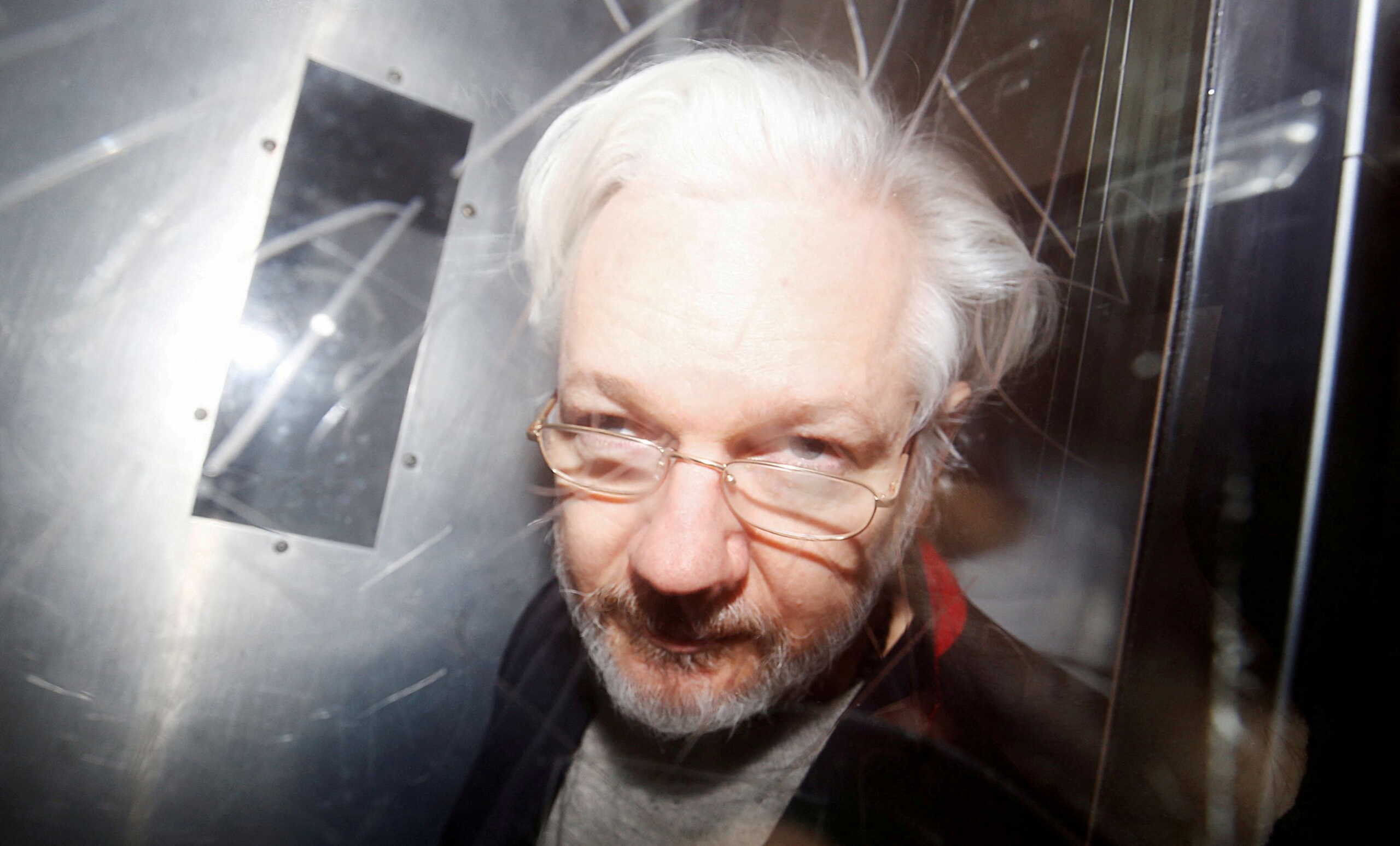 FILE PHOTO: WikiLeaks' founder Julian Assange leaves Westminster Magistrates Court in London, Britain January 13, 2020.  REUTERS