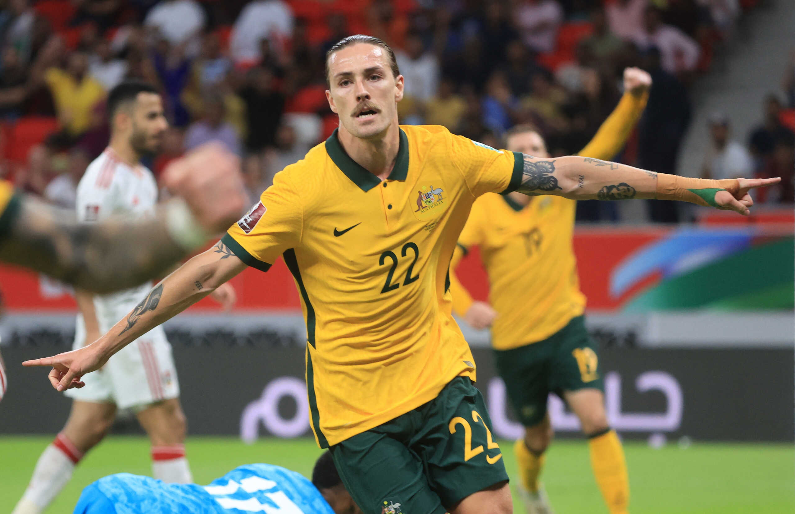 Soccer Football - FIFA World Cup Qualifier - United Arab Emirates v Australia - Al Rayyan Stadium, Doha, Qatar - June 7, 2022 Australia's Jackson Irvine celebrates scoring their first goal REUTERS