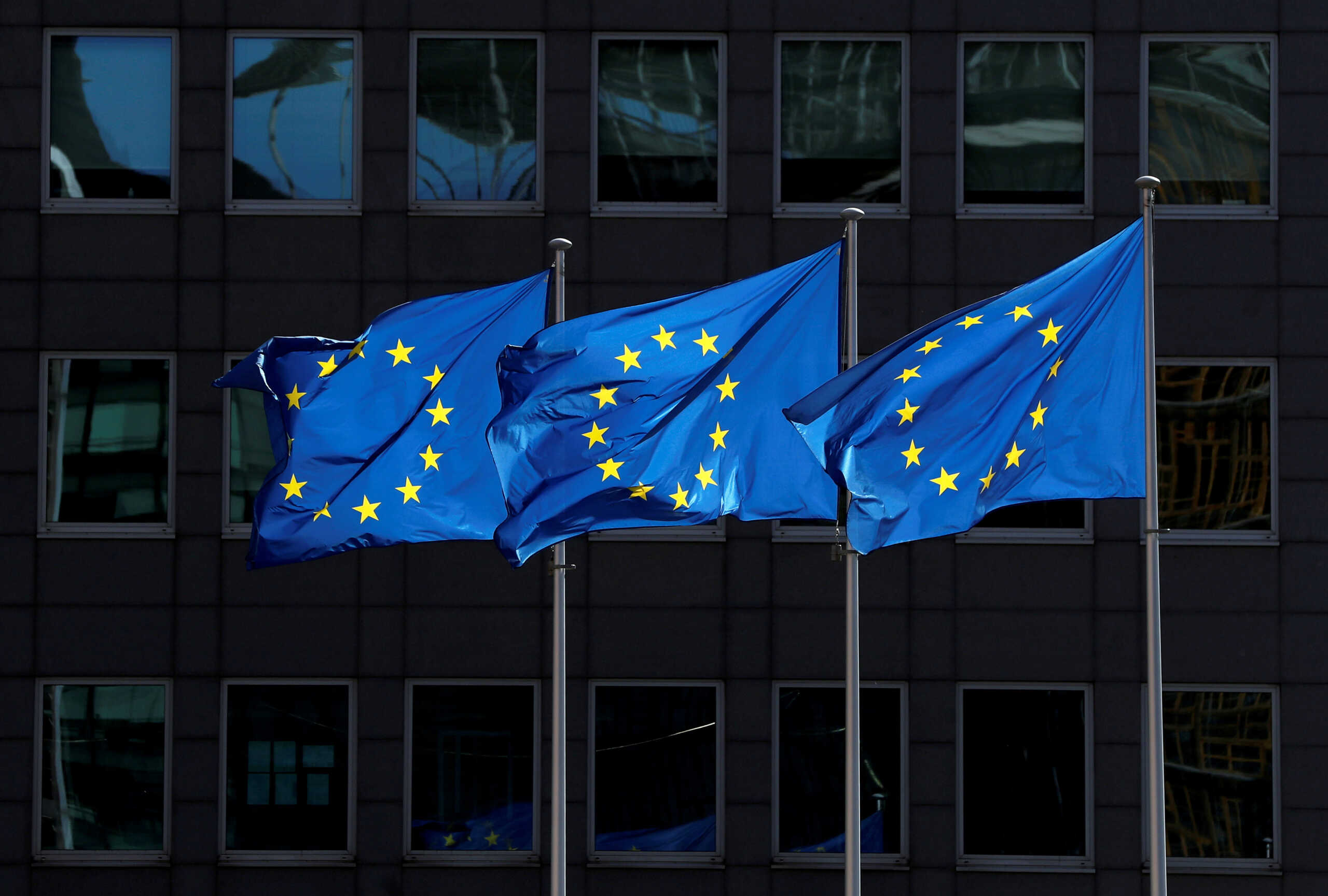 FILE PHOTO: European Union flags flutter outside the European Commission headquarters in Brussels, Belgium August 21, 2020. REUTERS