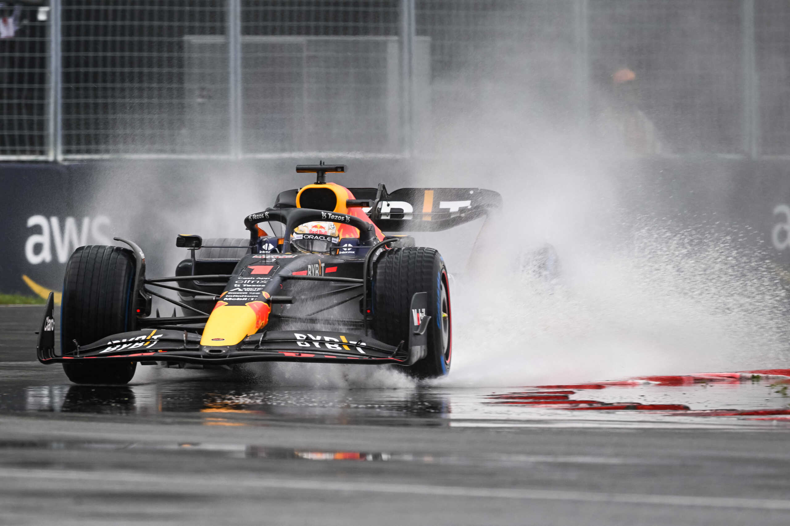 Jun 18, 2022; Montreal, Quebec, CAN; Red Bull Racing driver Max Verstappen of The Netherlands races in the senna turn during the qualifying session at Circuit Gilles Villeneuve. Mandatory Credit: David Kirouac-USA TODAY Sports