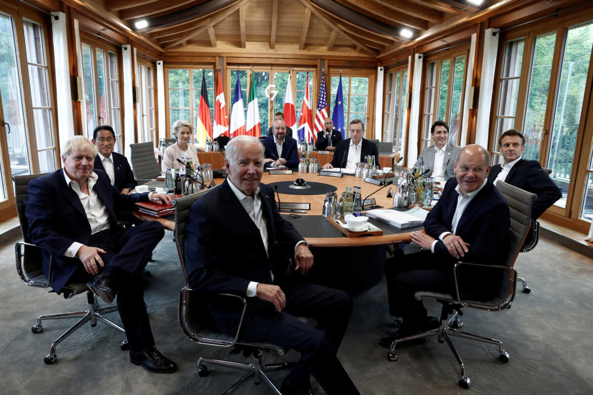 U.S. President Joe Biden, German Chancellor Olaf Scholz, British Prime Minister Boris Johnson, French President Emmanuel Macron, Canadian Prime Minister Justin Trudeau, Italian Prime Minister Mario Draghi, President of the European Commission Ursula von der Leyen, European Council President Charles Michel, and Japanese Prime Minister Fumio Kishida attend a working session during the G7 leaders summit at Bavaria's Schloss Elmau castle, near Garmisch-Partenkirchen, Germany, June 28, 2022. REUTERS
