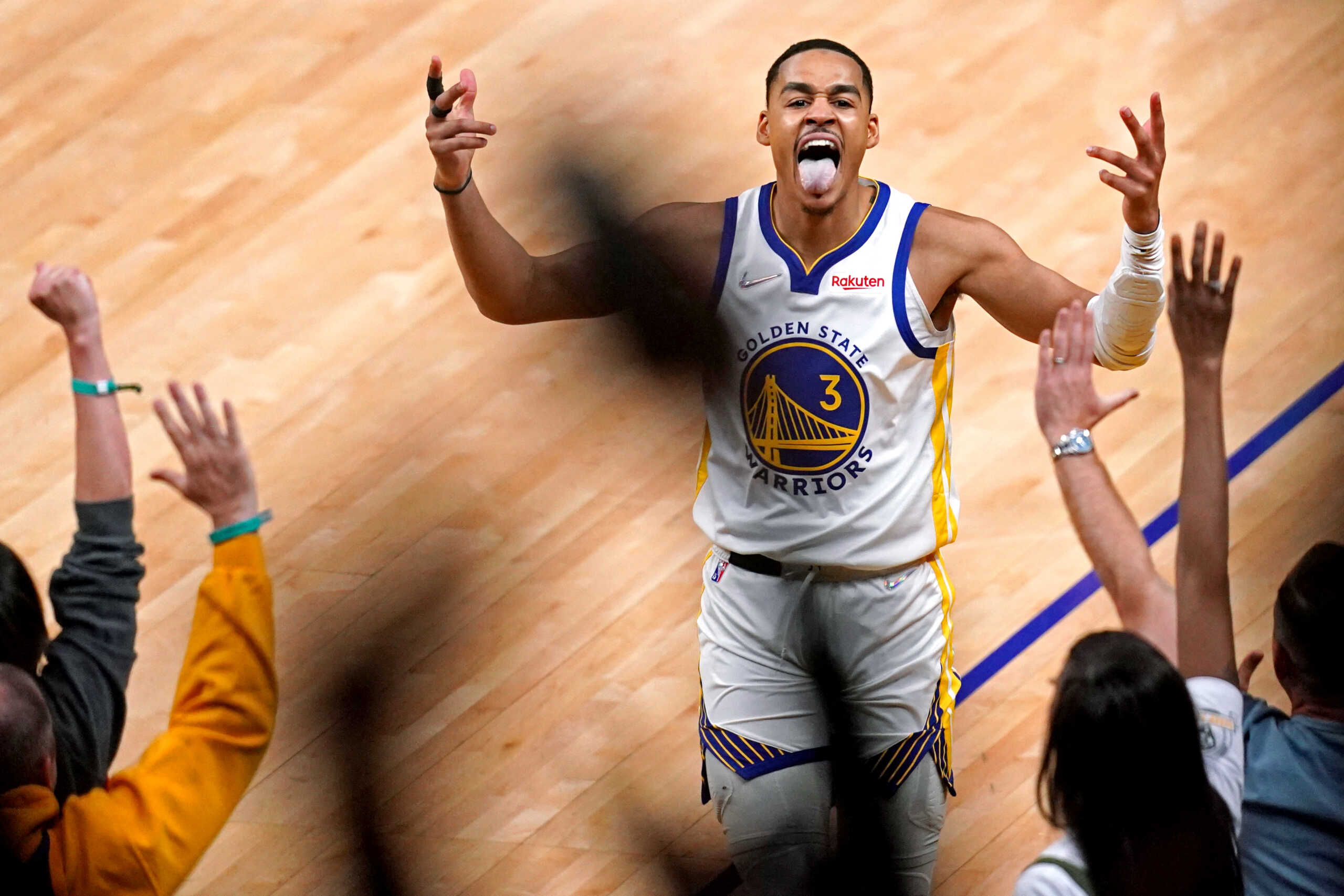 Jun 13, 2022; San Francisco, California, USA; Golden State Warriors guard Jordan Poole (3) reacts after making a shot at the end of the third quarter against the Boston Celtics in game five of the 2022 NBA Finals at Chase Center. Mandatory Credit: Cary Edmondson-USA TODAY Sports