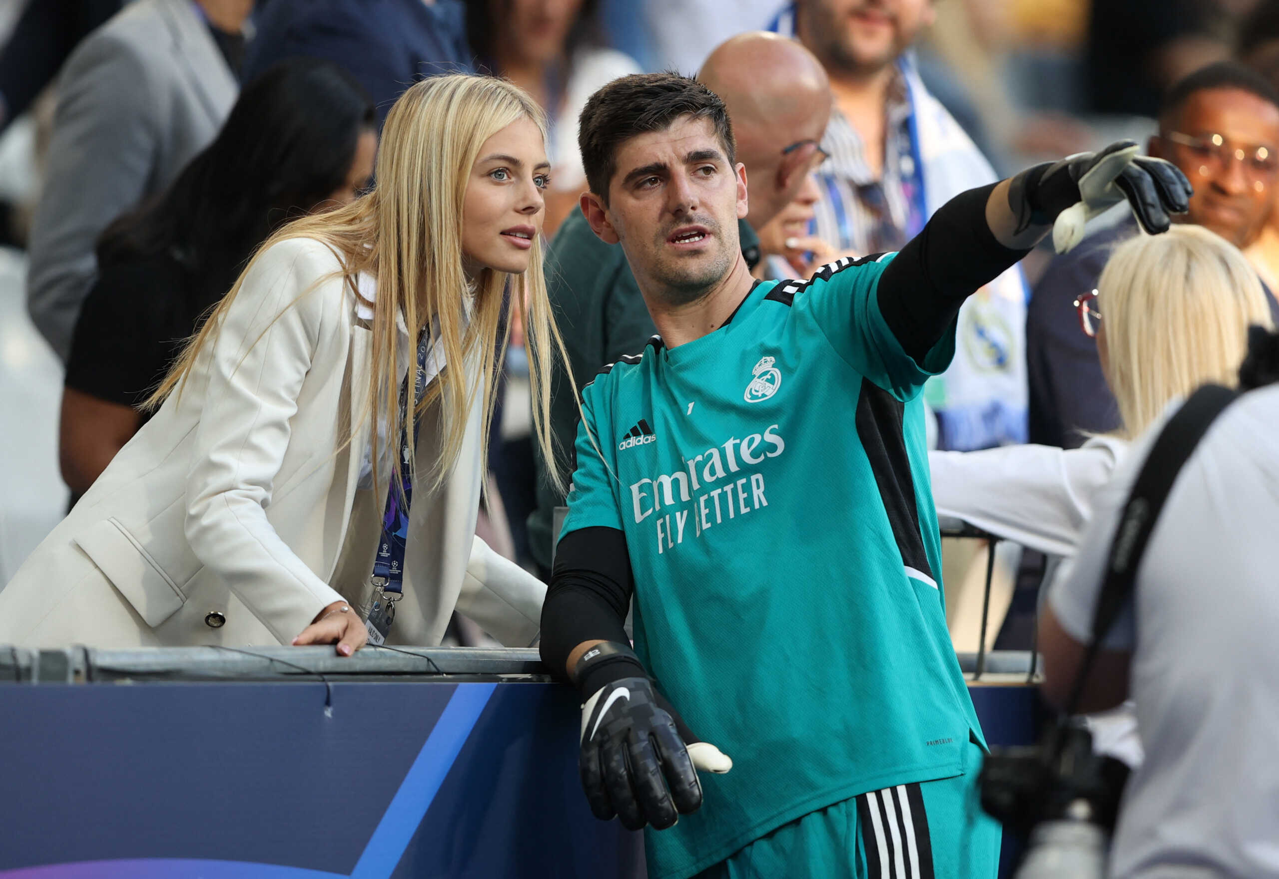 Soccer Football - Champions League - Champions League Final - Real Madrid Training - Stade de France, Saint-Denis near Paris, France - May 27, 2022 Real Madrid's Thibaut Courtois with his girlfriend Mishel Gerzig after training REUTERS