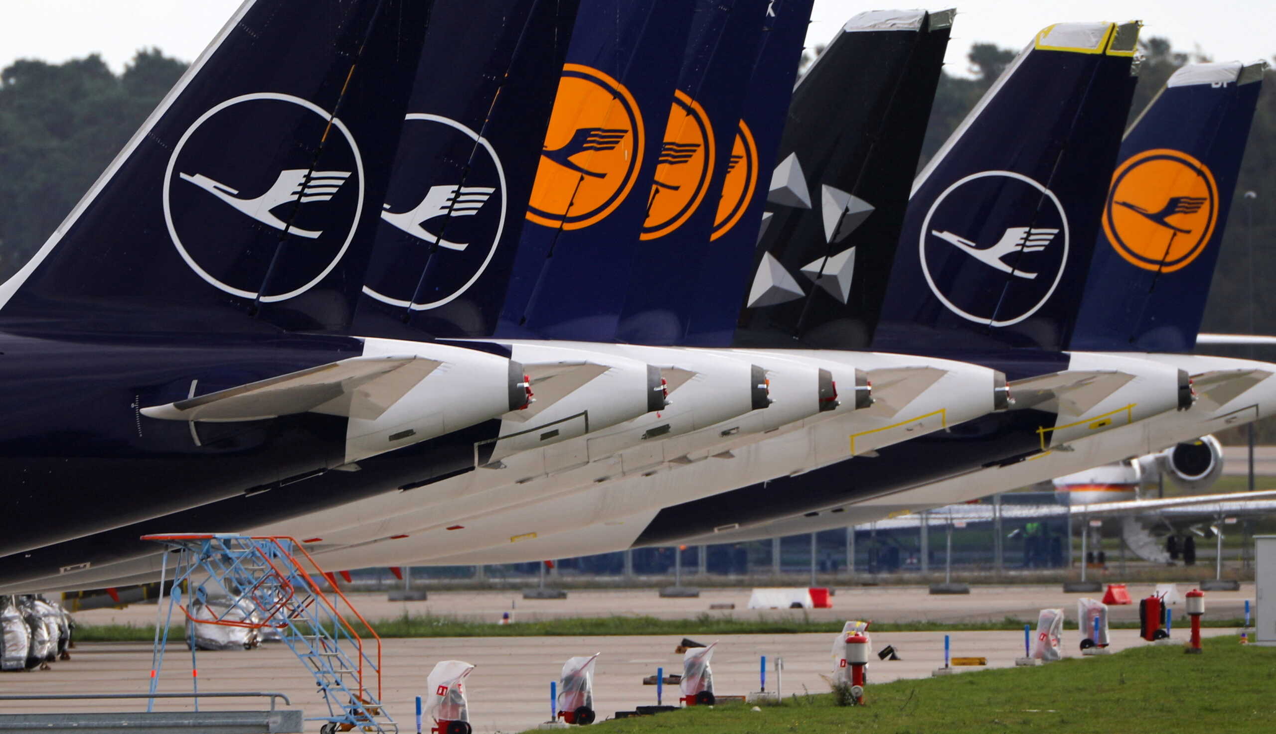 FILE PHOTO: Lufthansa airplanes are seen at the Terminal 1 of the new Berlin-Brandenburg Airport 'Willy Brandt' in Schoenefeld near Berlin, Germany October 29, 2020. REUTERS