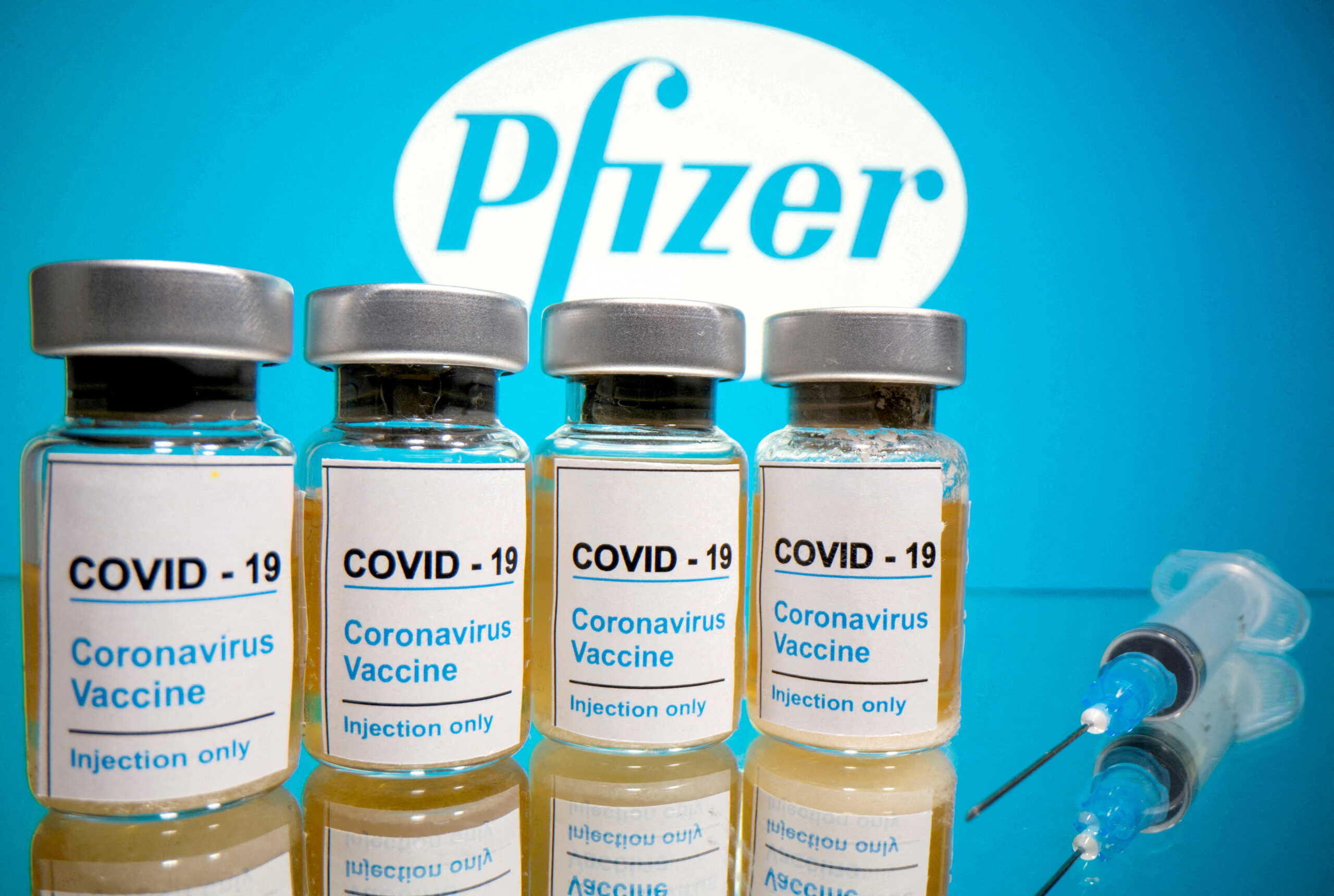 FILE PHOTO: Vials with a sticker reading, "COVID-19