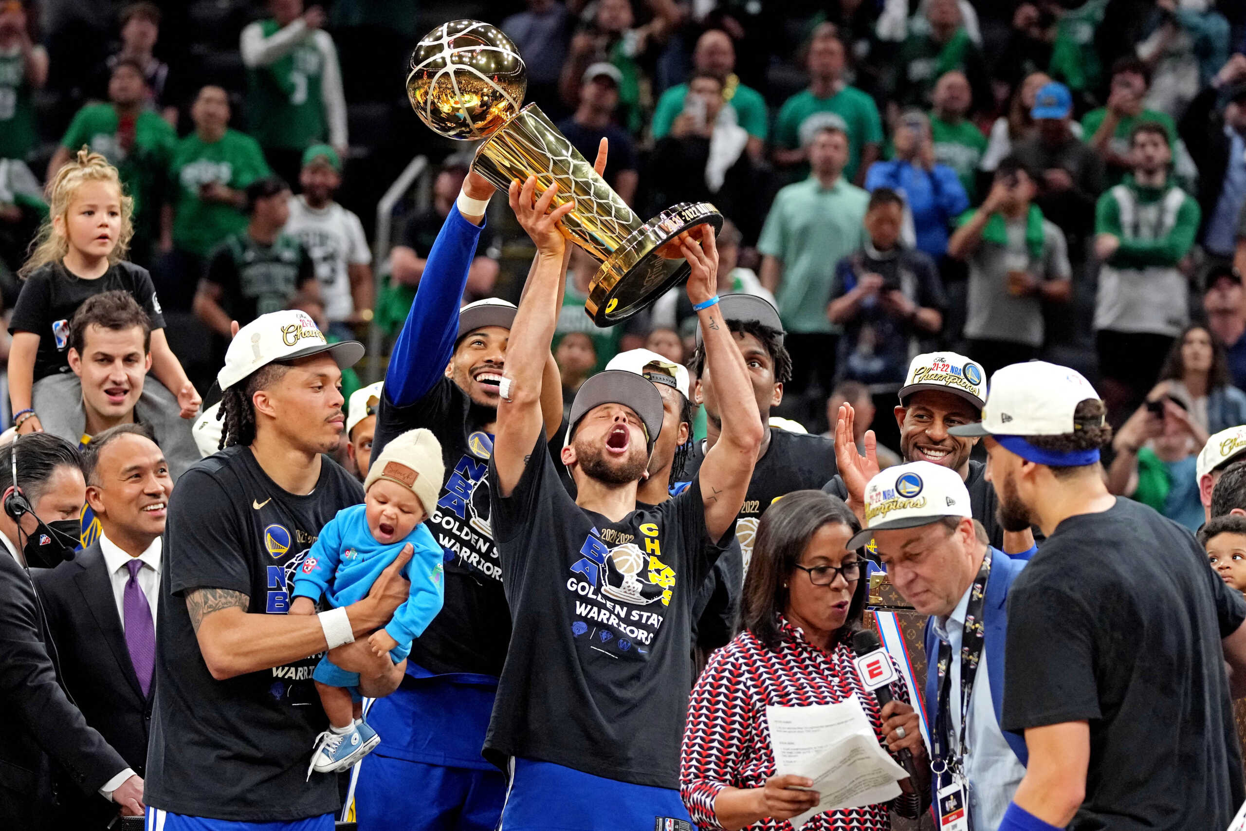 Jun 16, 2022; Boston, Massachusetts, USA; Golden State Warriors guard Stephen Curry (30) celebrates with the the Larry O'Brien Championship Trophy after the Golden State Warriors beat the Boston Celtics in game six of the 2022 NBA Finals to win the NBA Championship at TD Garden. Mandatory Credit: Kyle Terada-USA TODAY Sports