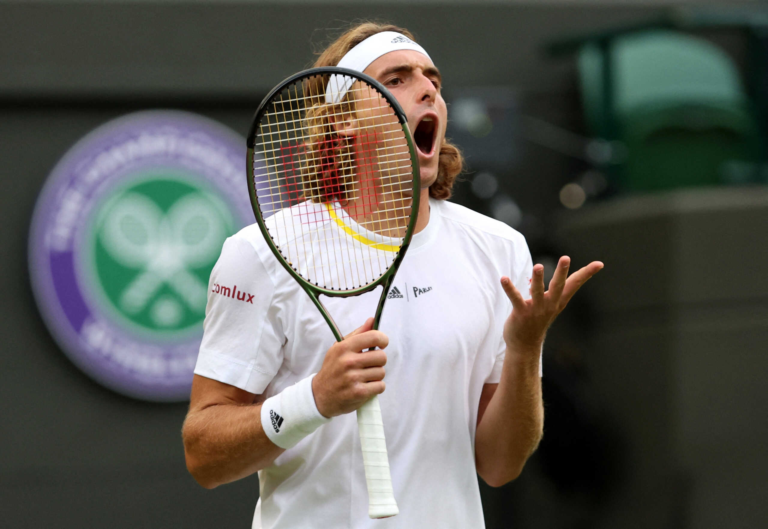 Tennis - Wimbledon - All England Lawn Tennis and Croquet Club, London, Britain - June 28, 2022 Greece's Stefanos Tsitsipas reacts during his first round match against Switzerland's Alexander Ritschard REUTERS