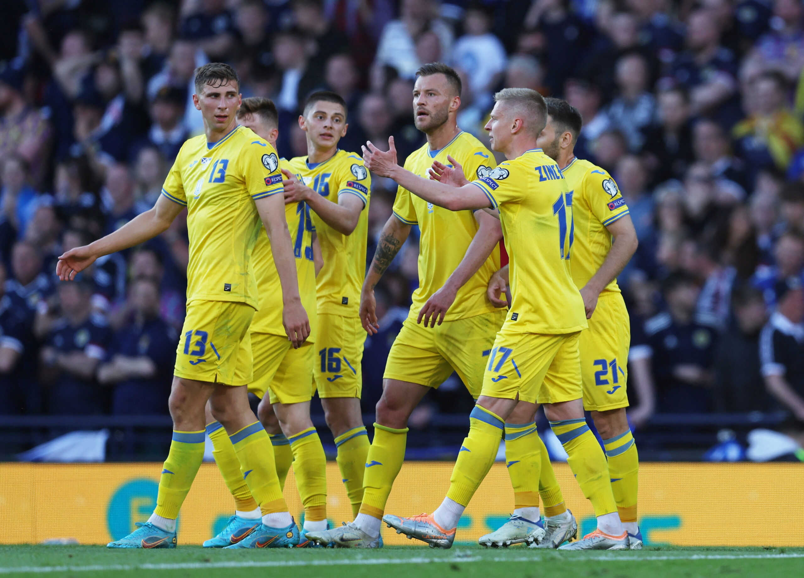 Soccer Football - World Cup - UEFA Qualifiers - Play-off Semi Final - Scotland v Ukraine - Hampden Park, Glasgow, Scotland, Britain - June 1, 2022 Ukraine's Andriy Yarmolenko celebrates scoring their first goal with teammates REUTERS