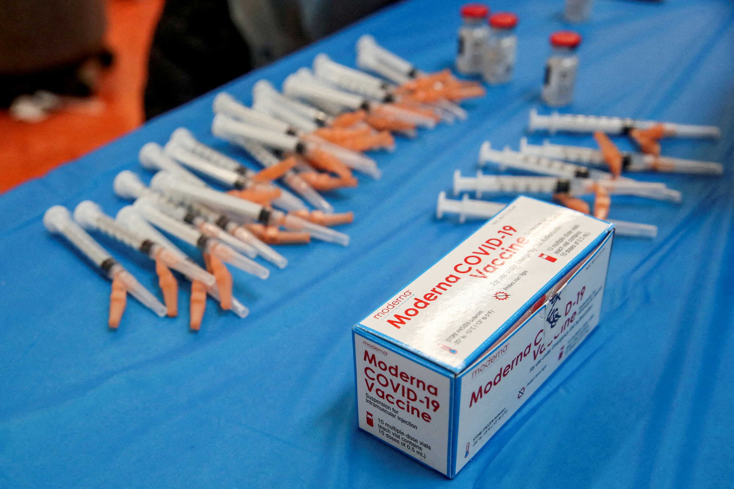 FILE PHOTO: The Moderna COVID-19 vaccine sits on the table at Trinity United Church of Christ in Chicago, Illinois, U.S., February 13, 2021.  REUTERS