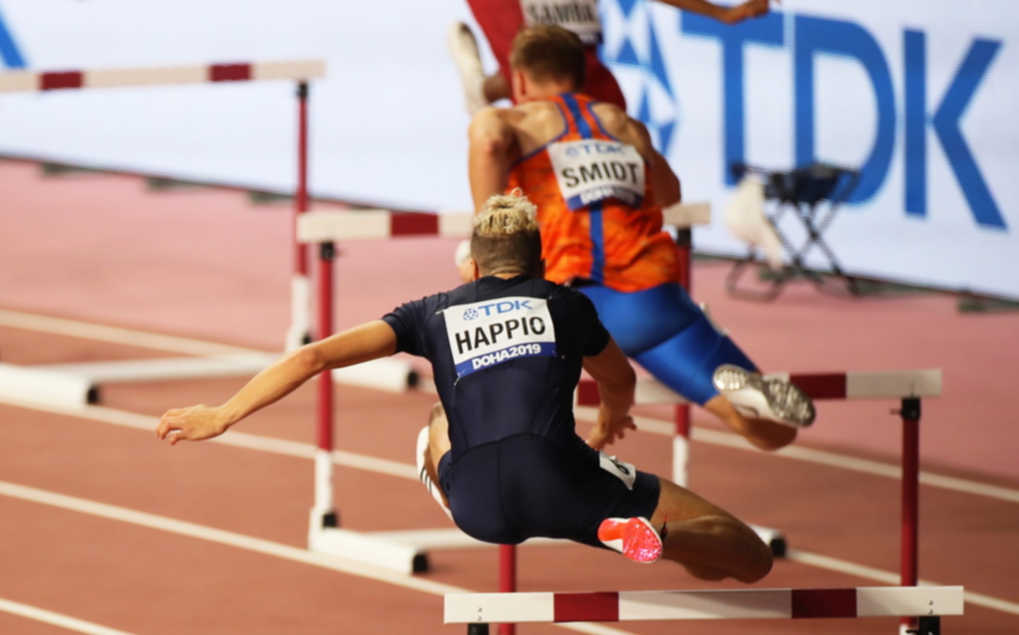 epa07874830 Wilfried Happio (front) of France in action during the men's 400m Hurdles heats at the IAAF World Athletics Championships 2019 at the Khalifa Stadium in Doha, Qatar, 27 September 2019. EPA