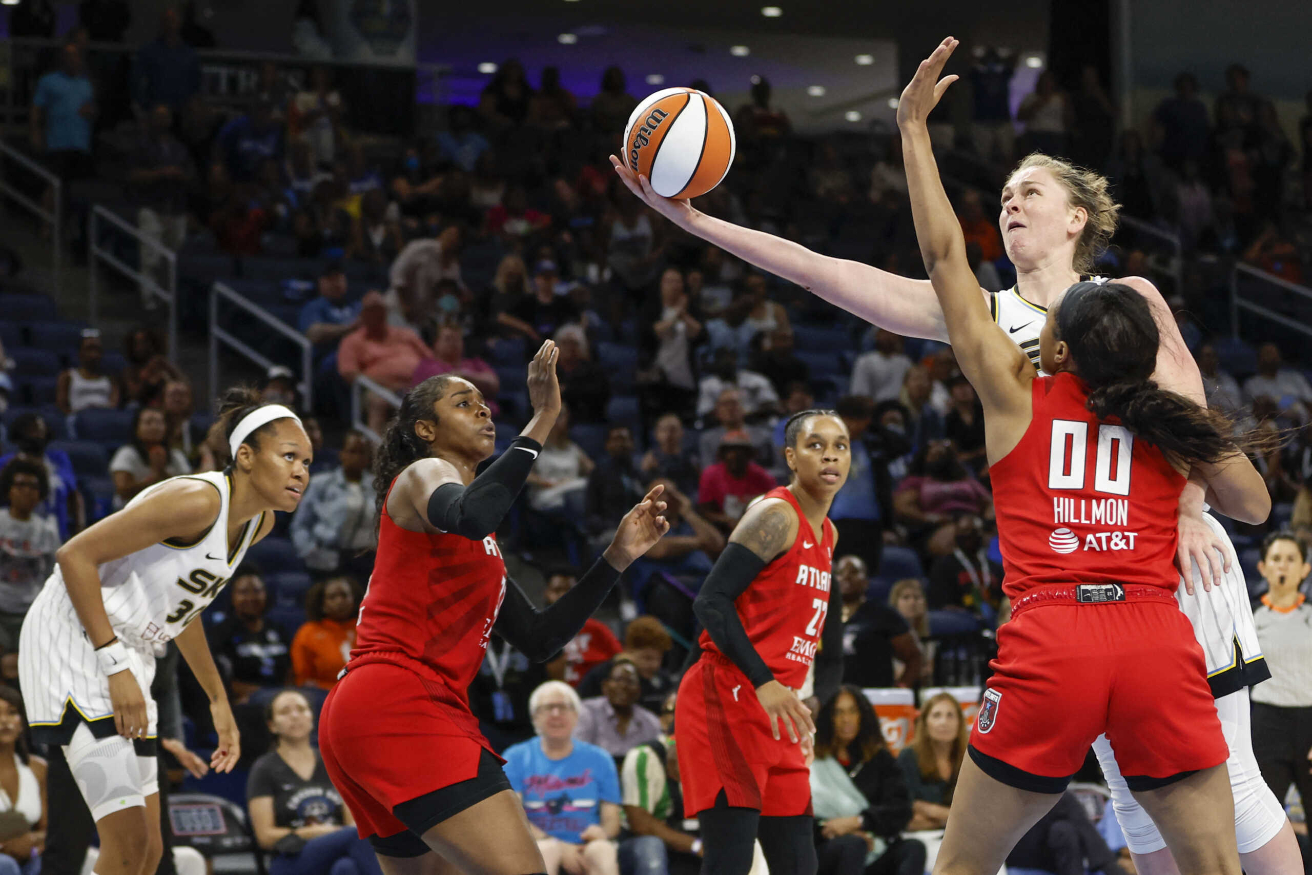 Jun 17, 2022; Chicago, Illinois, USA; Chicago Sky forward Emma Meesseman (33) shoots against Atlanta Dream forward Naz Hillmon (00) during the second half of a WNBA game at Wintrust Arena. Mandatory Credit: Kamil Krzaczynski-USA TODAY Sports