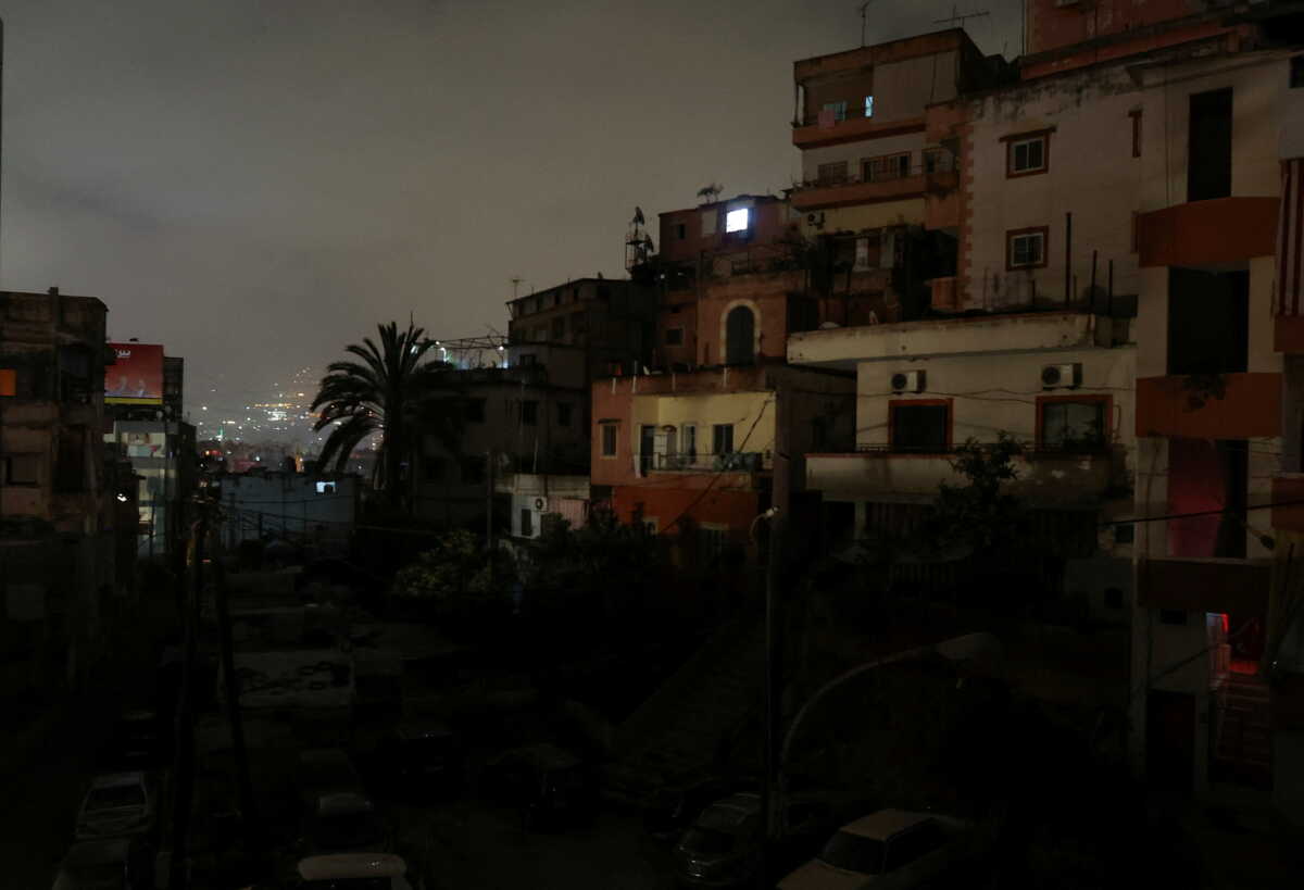 FILE PHOTO: Residential buildings are pictured at night during a power cut in Beirut, Lebanon April 27, 2022.  REUTERS