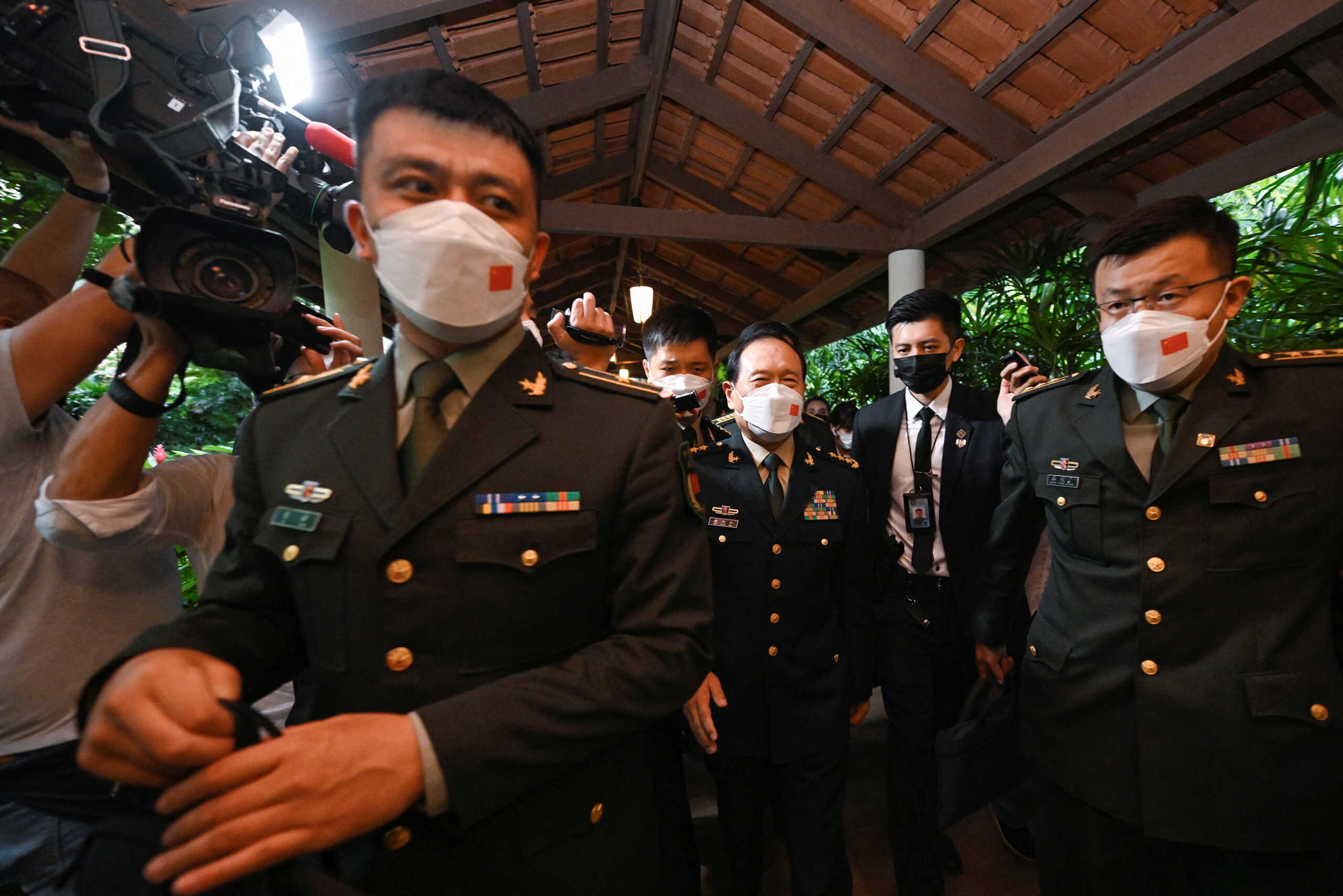 China's State Councilor and Defence Minister General Wei Fenghe leaves after a bilateral meeting with U.S. Defence Secretary Lloyd Austin on the sidelines of the 19th Shangri-La Dialogue in Singapore, June 10, 2022. REUTERS