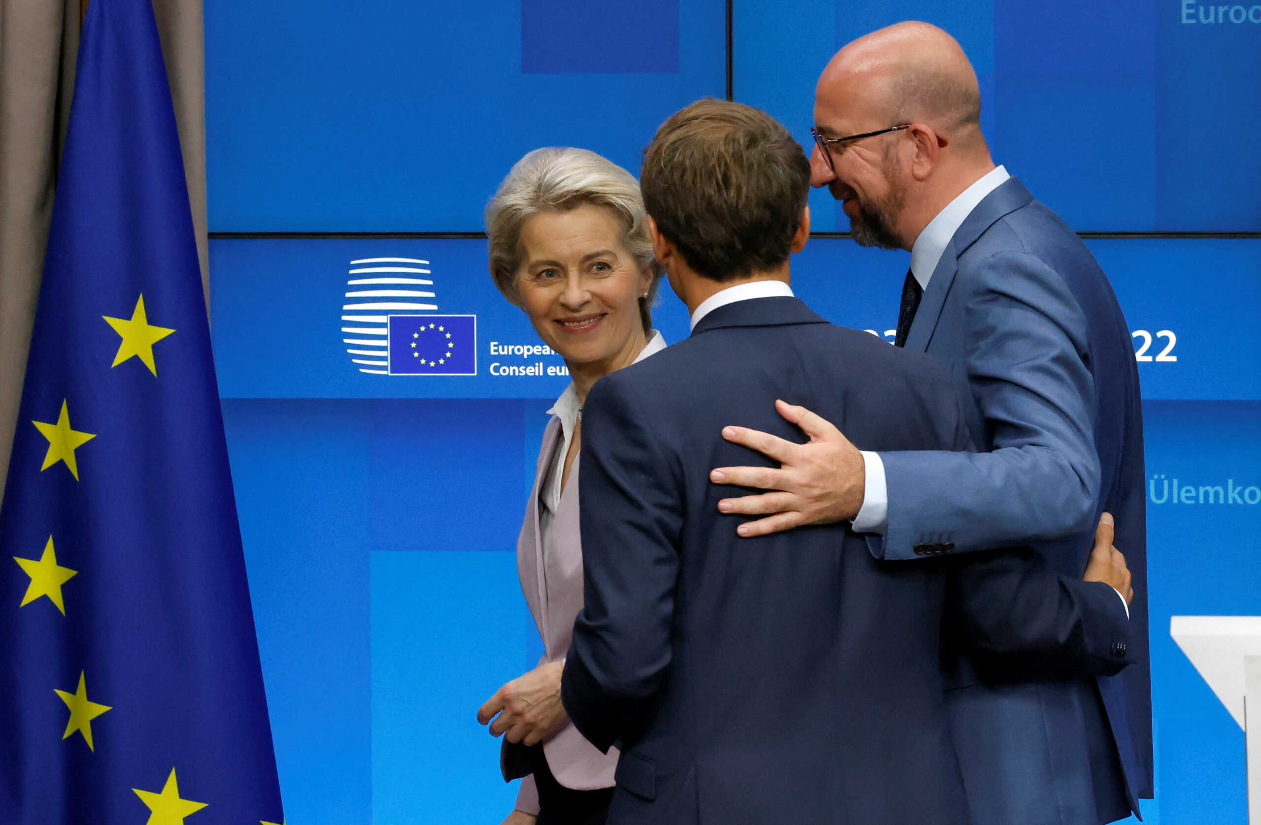 European Commission President Ursula von der Leyen, French President Emmanuel Macron and European Council President Charles Michel speak as they walk following a joint news conference in Brussels, Belgium May 23, 2022. REUTERS