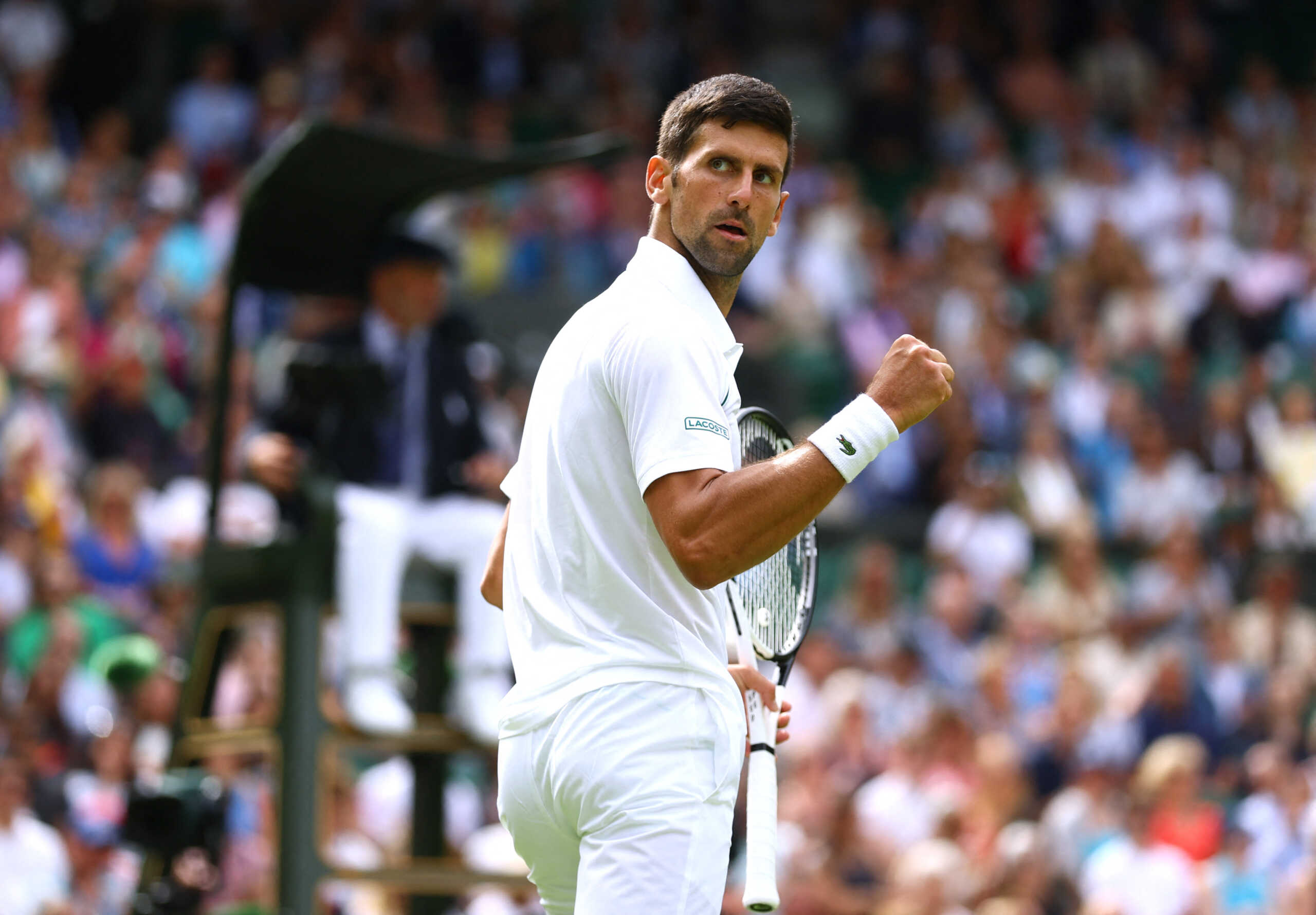 Tennis - Wimbledon - All England Lawn Tennis and Croquet Club, London, Britain - June 29, 2022  Serbia'a Novak Djokovic celebrates winning his second round match against Australia's Thanasi Kokkinakis REUTERS