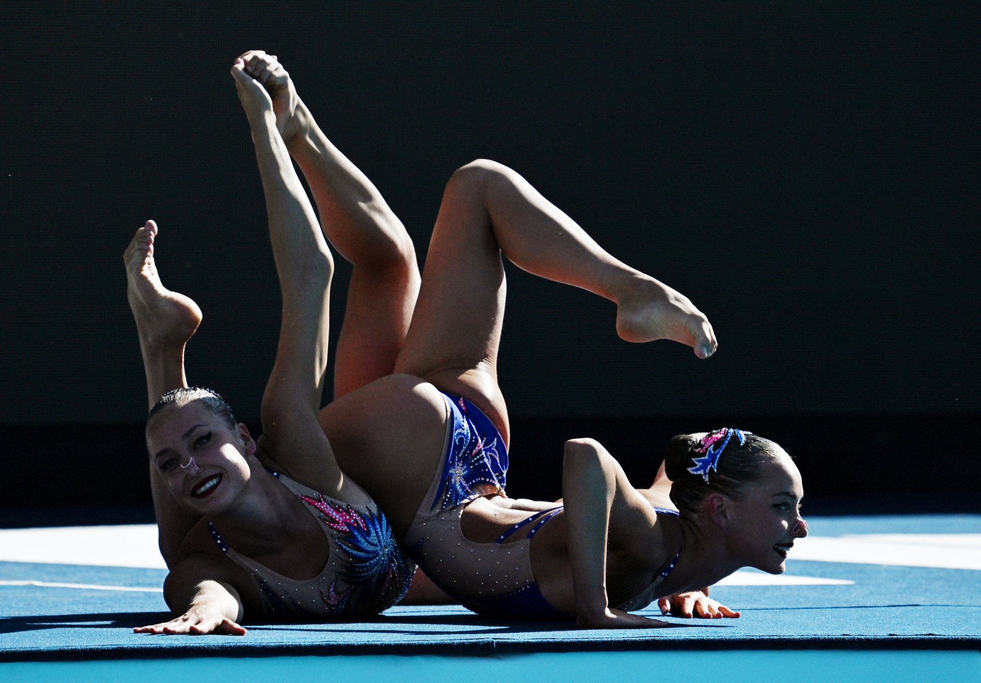 Swimming - FINA World Championships - Budapest, Hungary - June 19, 2022 Ukraine's Maryna Aleksiiva and Vladyslava Aleksiiva perform during the women's duet technical final REUTERS
