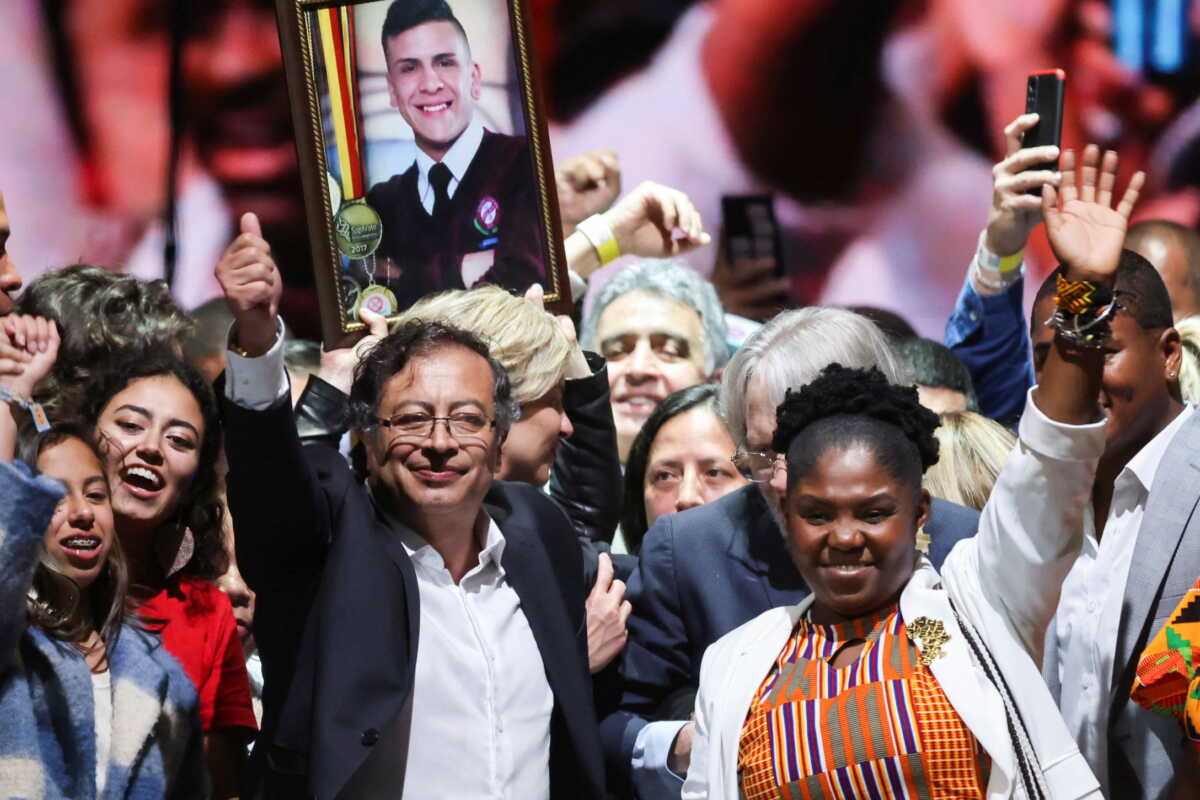 Colombian left-wing presidential candidate Gustavo Petro and his candidate for Vice-President Francia Marquez of the Historic Pact coalition celebrate after Petro's victory in the second round of the presidential election, at the Movistar Arena, in Bogota, Colombia June 19, 2022. REUTERS
