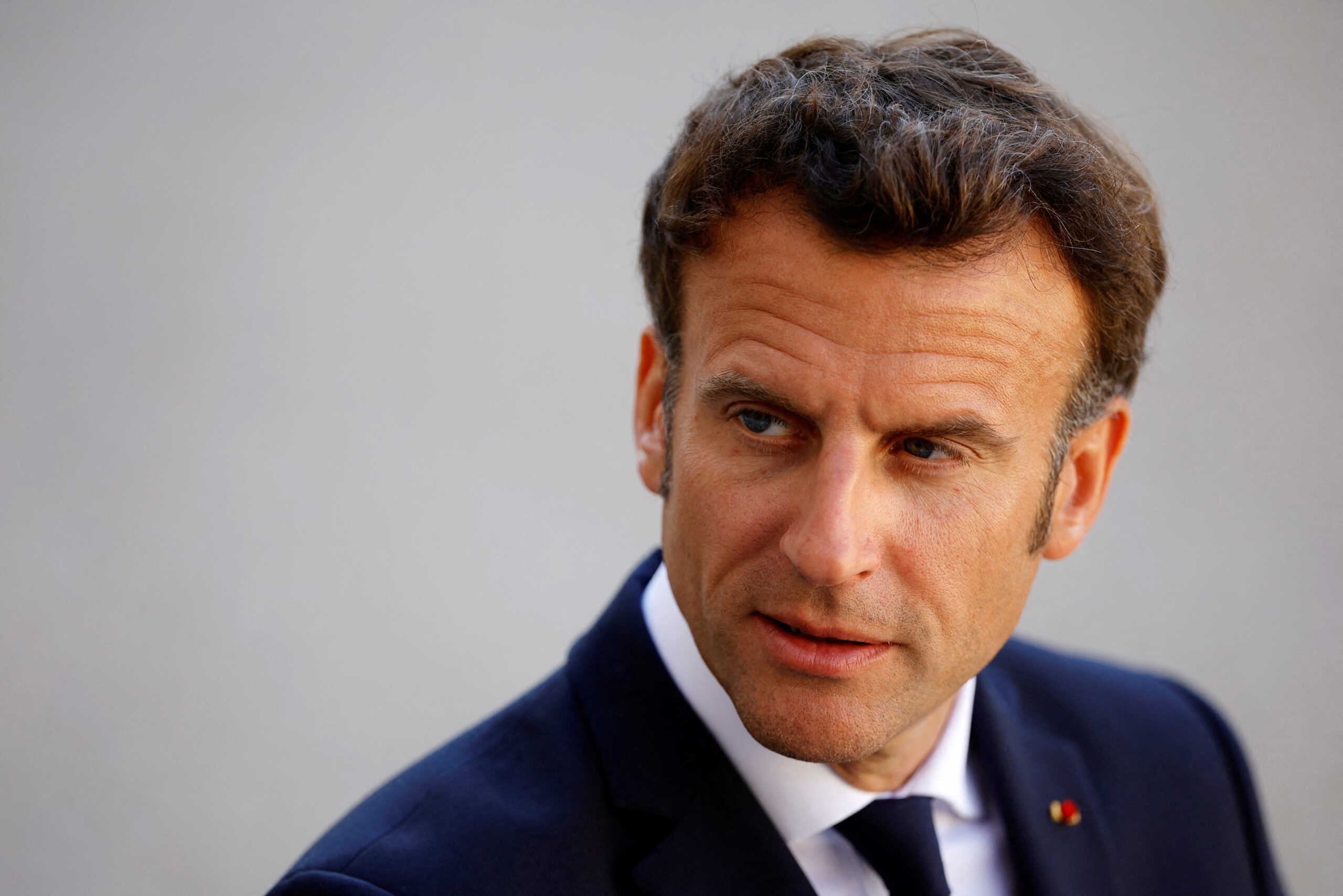 FILE PHOTO: French President Emmanuel Macron delivers a joint statement with Czech Prime Minister Petr Fiala (not seen) before a meeting at the Elysee Palace in Paris, France, June 7, 2022. REUTERS