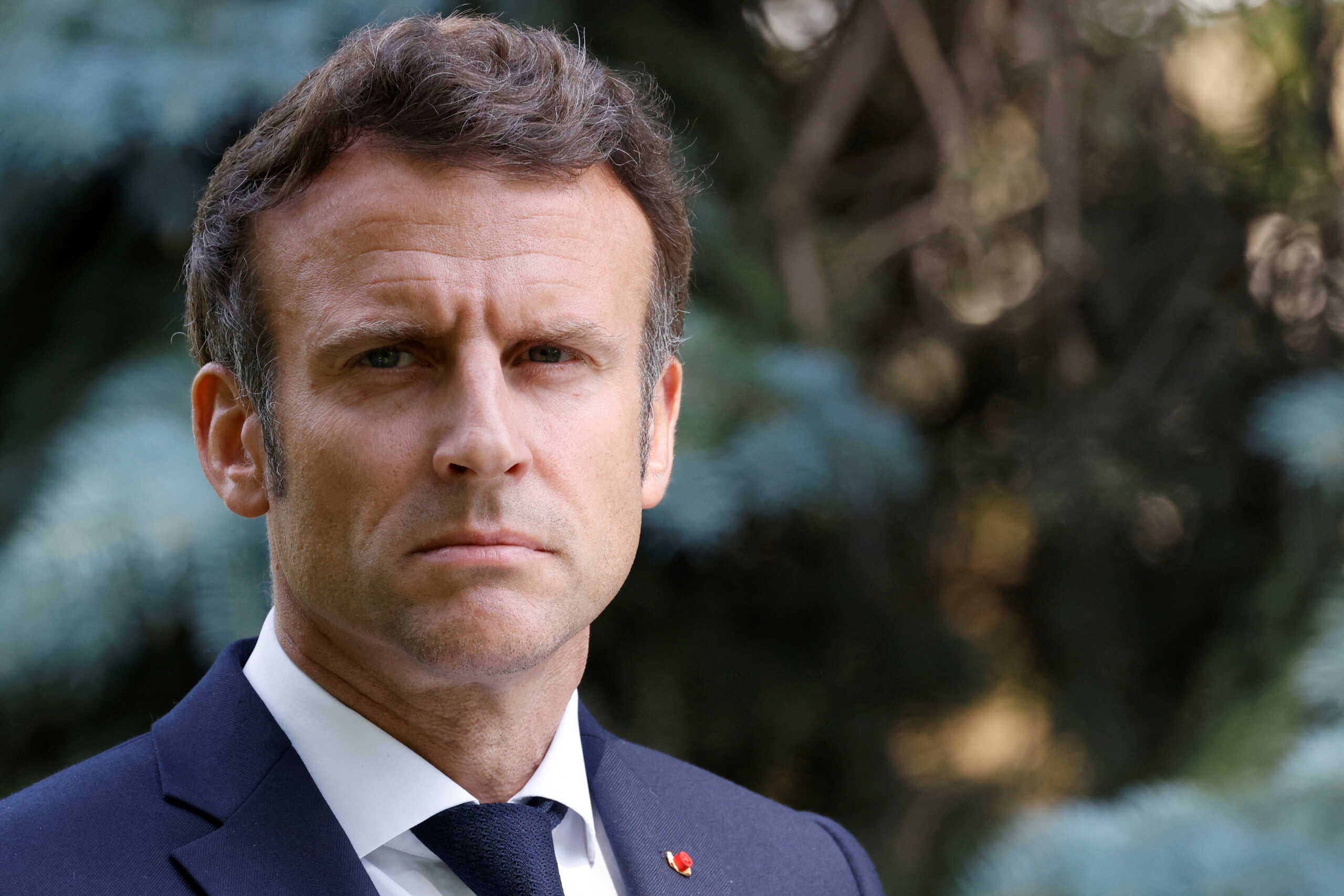 French President Emmanuel Macron reacts during a news conference with Ukrainian President Volodymyr Zelenskiy, German Chancellor Olaf Scholz, Romanian President Klaus Iohannis and Italian Prime Minister Mario Draghi in Kyiv, Ukraine June 16, 2022. Ludovic Marin