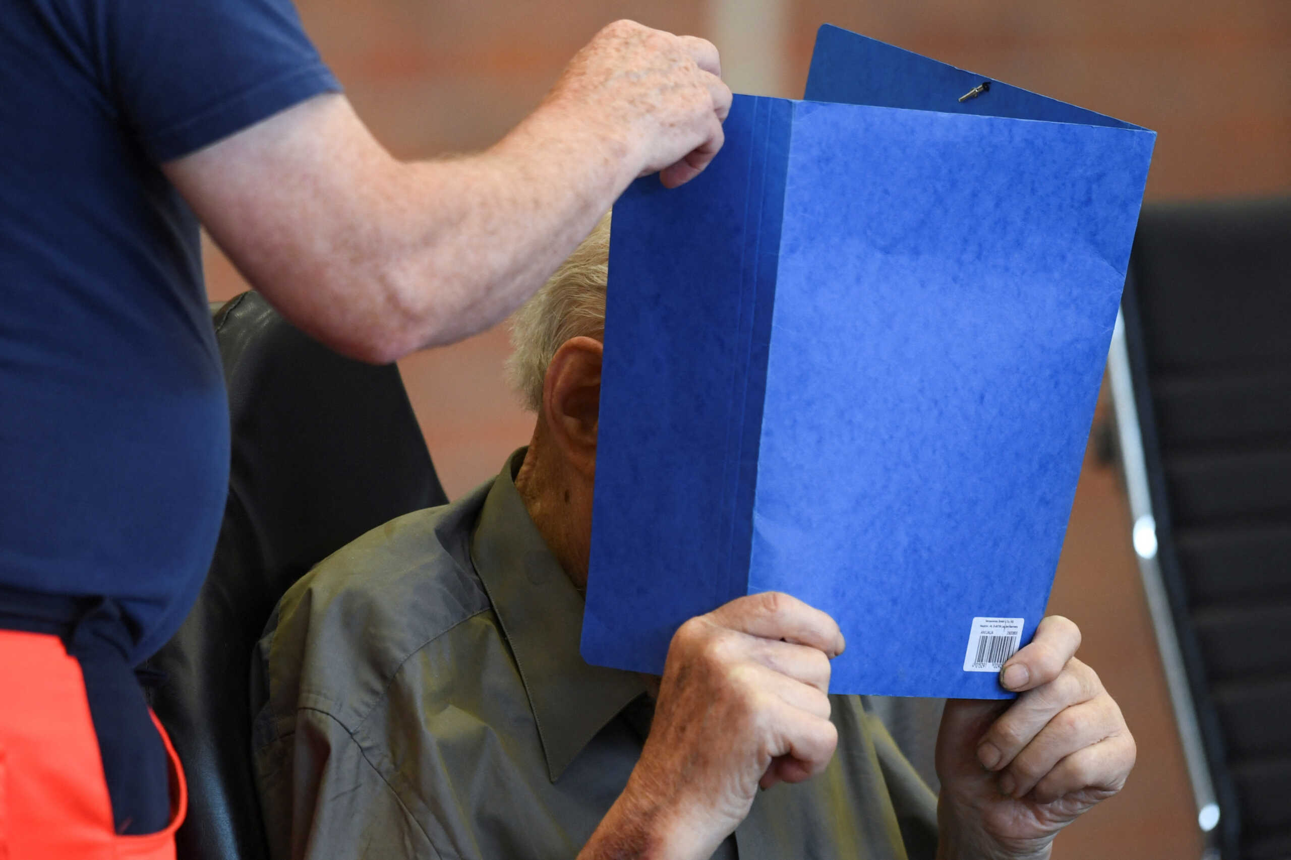A 101-year-old former security guard of the Sachsenhausen concentration camp appears in the courtroom before his trial verdict at the Landgericht Neuruppin court, in Brandenburg, Germany June 28, 2022. REUTERS